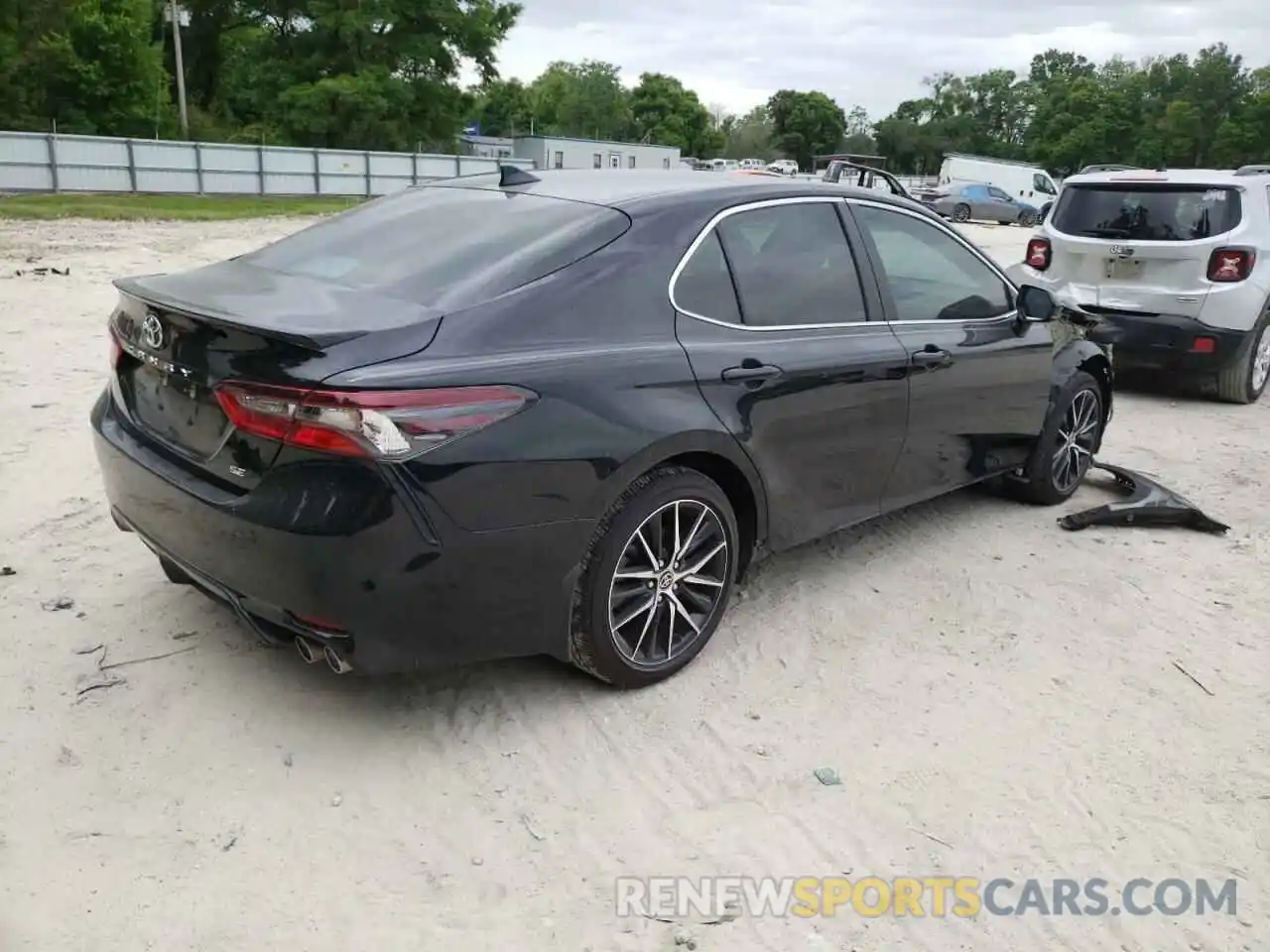 4 Photograph of a damaged car 4T1G11AK6MU575828 TOYOTA CAMRY 2021