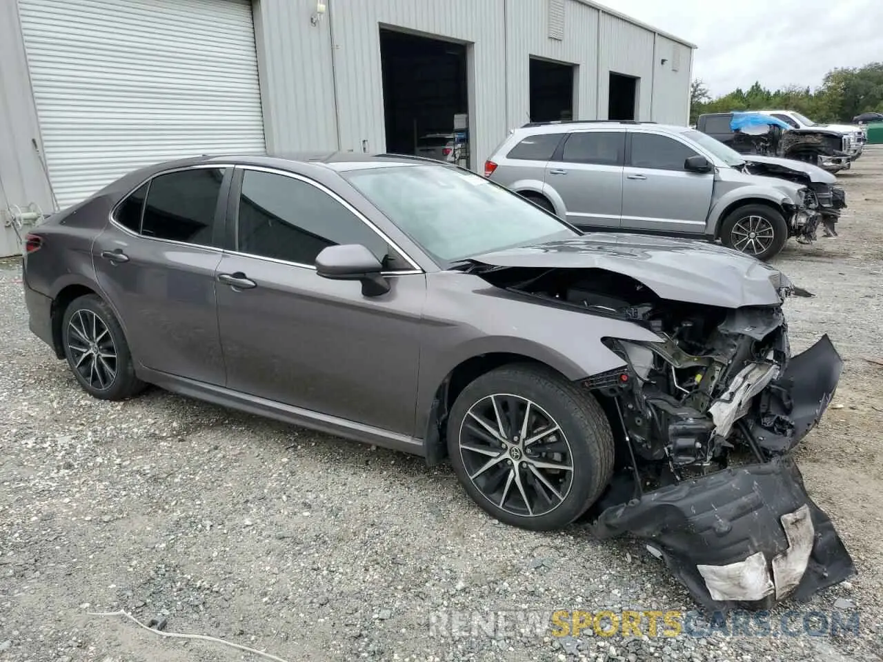 4 Photograph of a damaged car 4T1G11AK6MU581497 TOYOTA CAMRY 2021