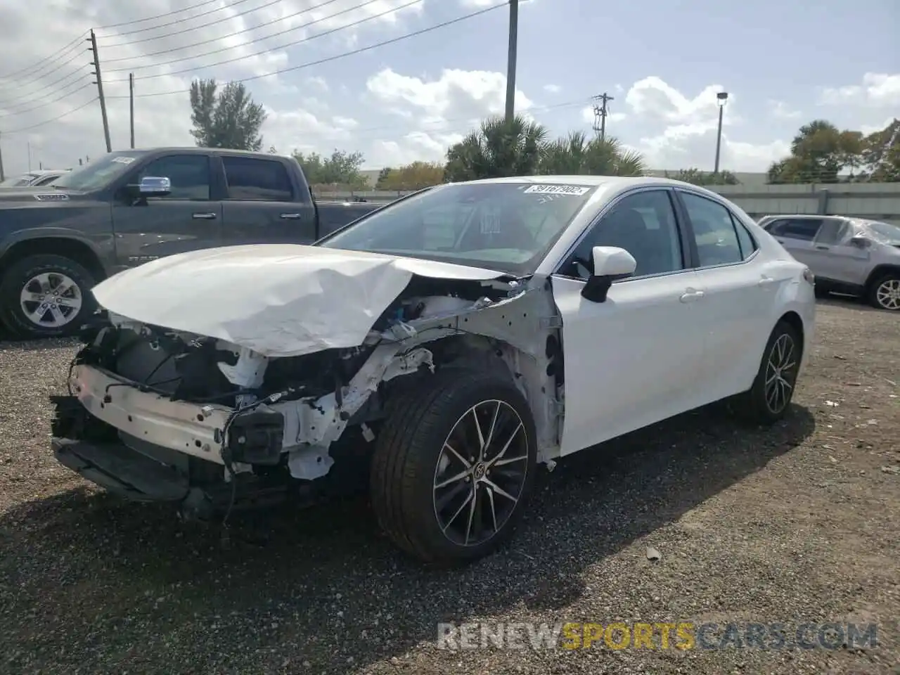 2 Photograph of a damaged car 4T1G11AK7MU475009 TOYOTA CAMRY 2021