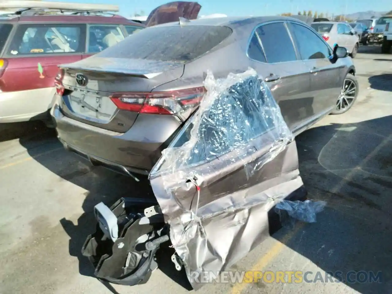 4 Photograph of a damaged car 4T1G11AK7MU579211 TOYOTA CAMRY 2021