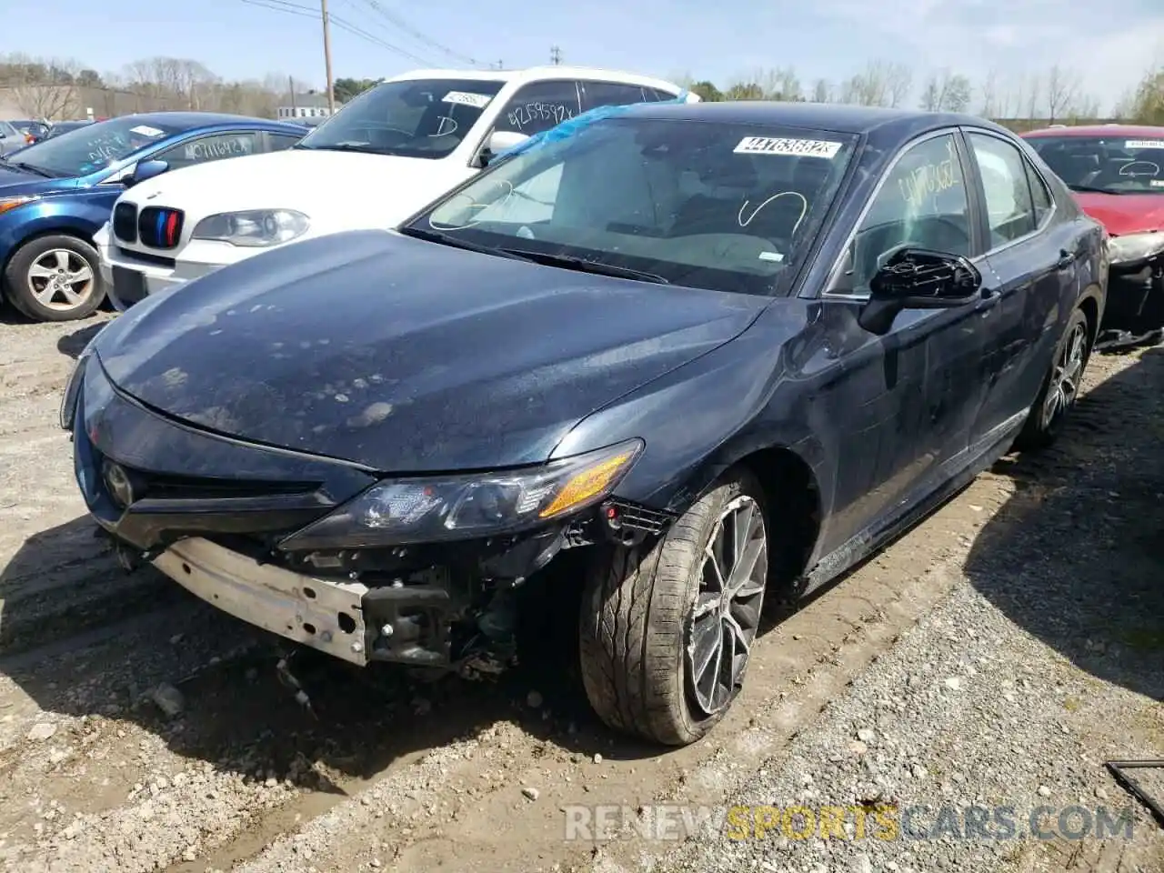 2 Photograph of a damaged car 4T1G11AK9MU407889 TOYOTA CAMRY 2021