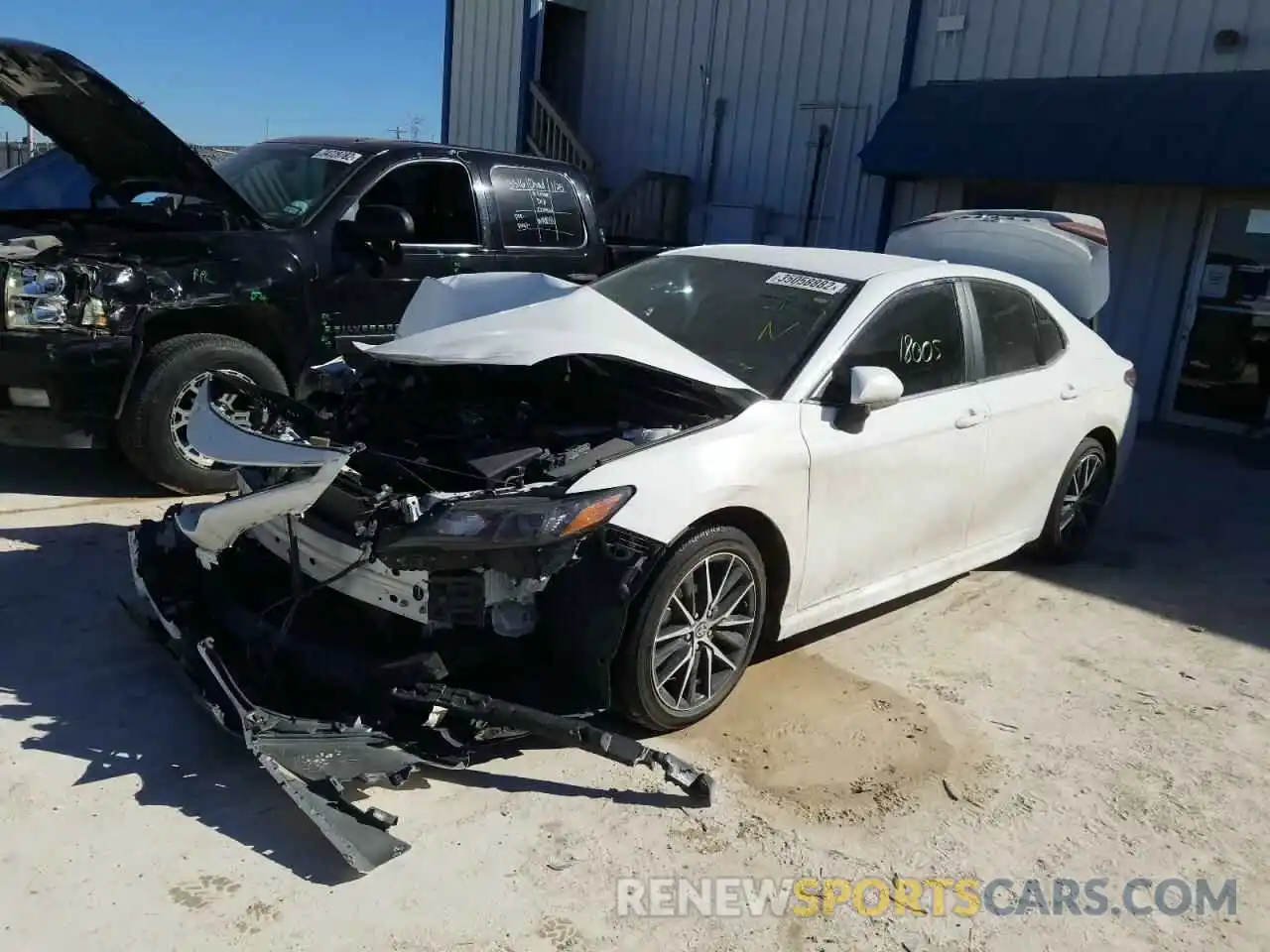 2 Photograph of a damaged car 4T1G11AK9MU431948 TOYOTA CAMRY 2021