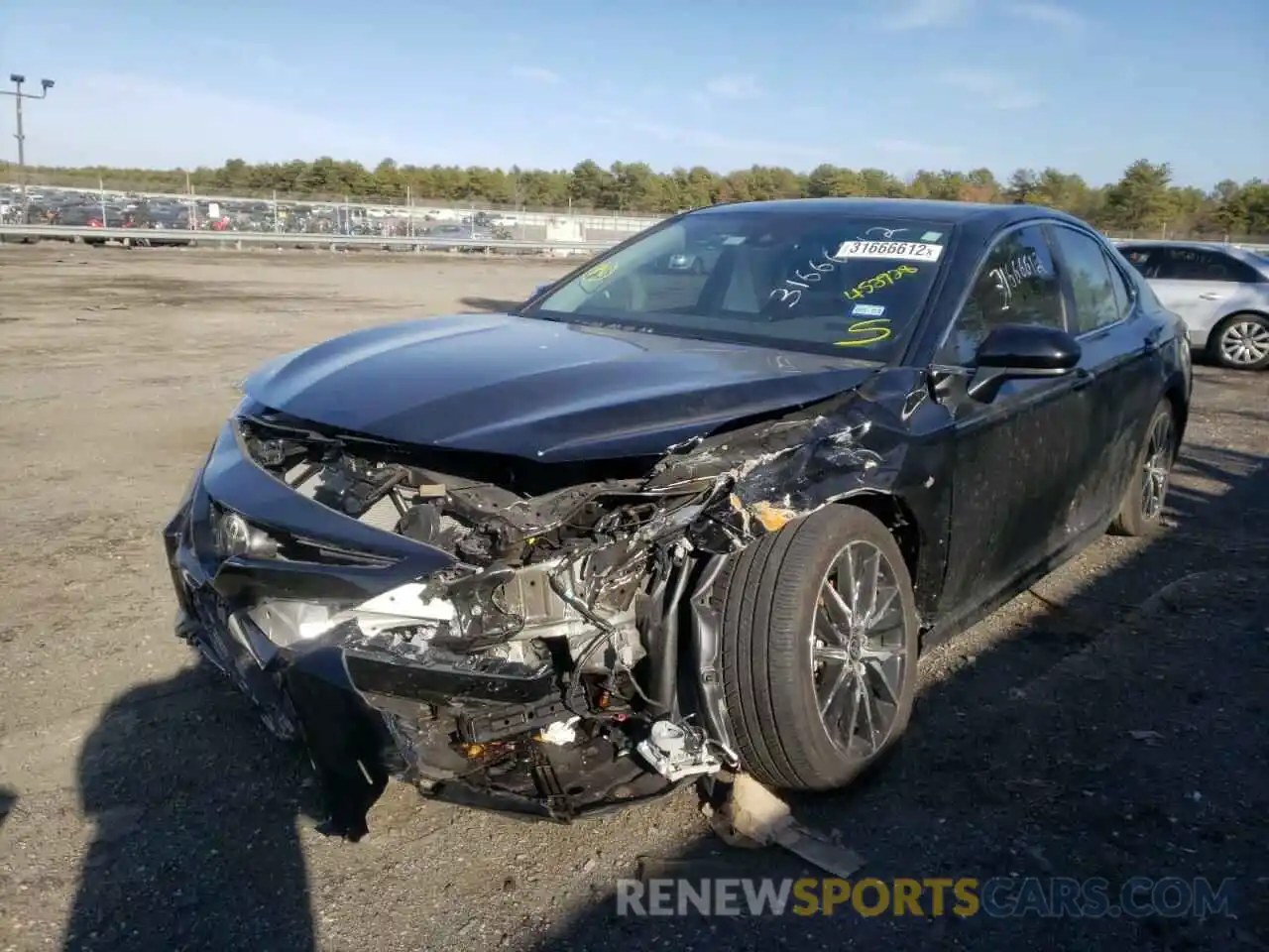 2 Photograph of a damaged car 4T1G11AK9MU452928 TOYOTA CAMRY 2021