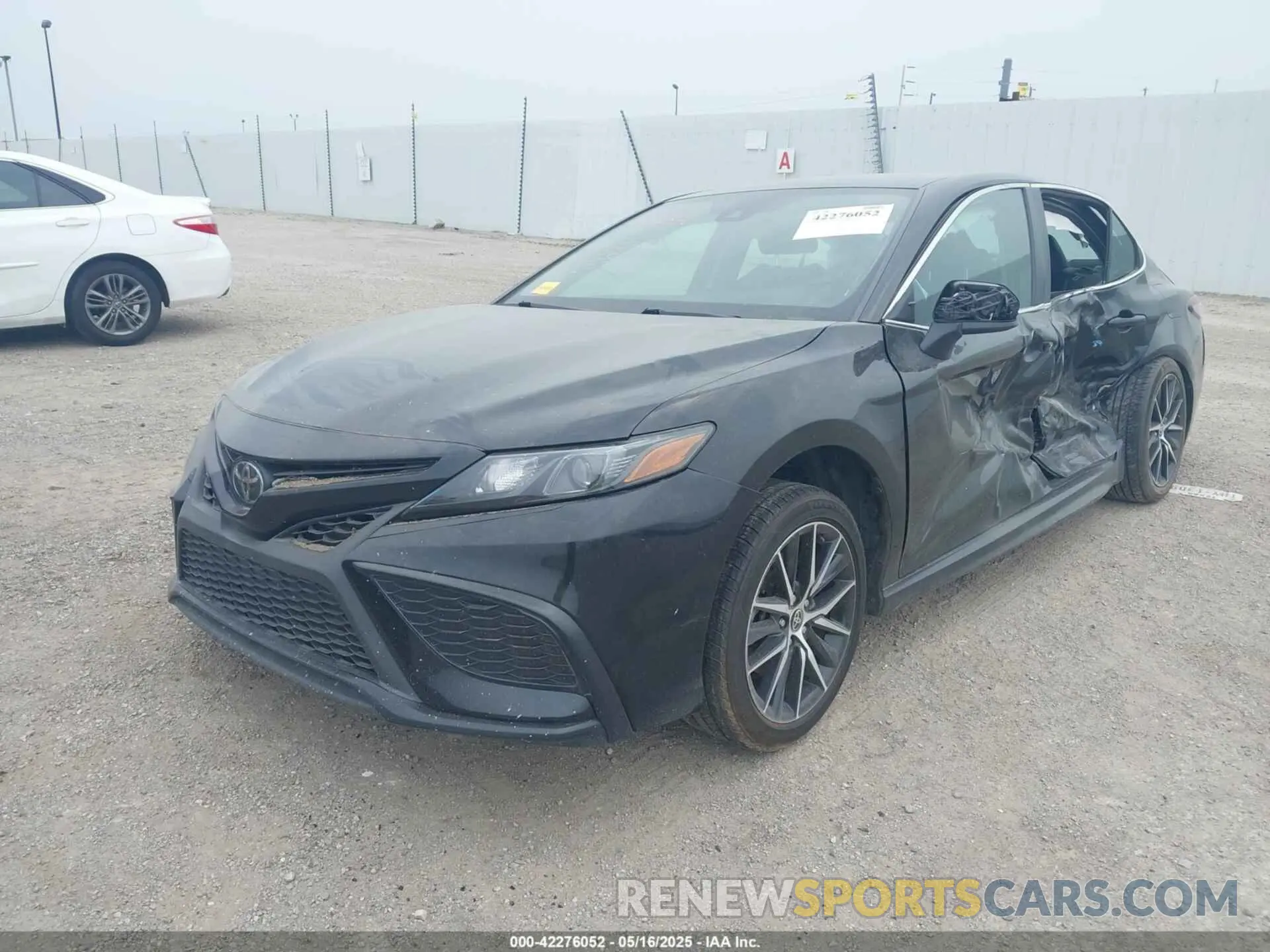 2 Photograph of a damaged car 4T1G11AK9MU473519 TOYOTA CAMRY 2021