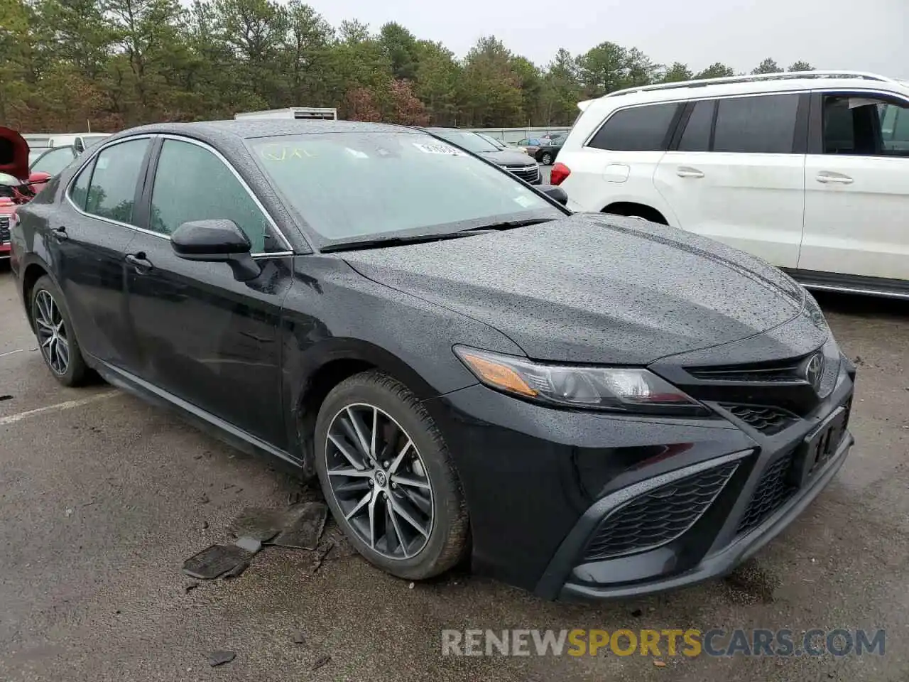 4 Photograph of a damaged car 4T1G11AK9MU523318 TOYOTA CAMRY 2021