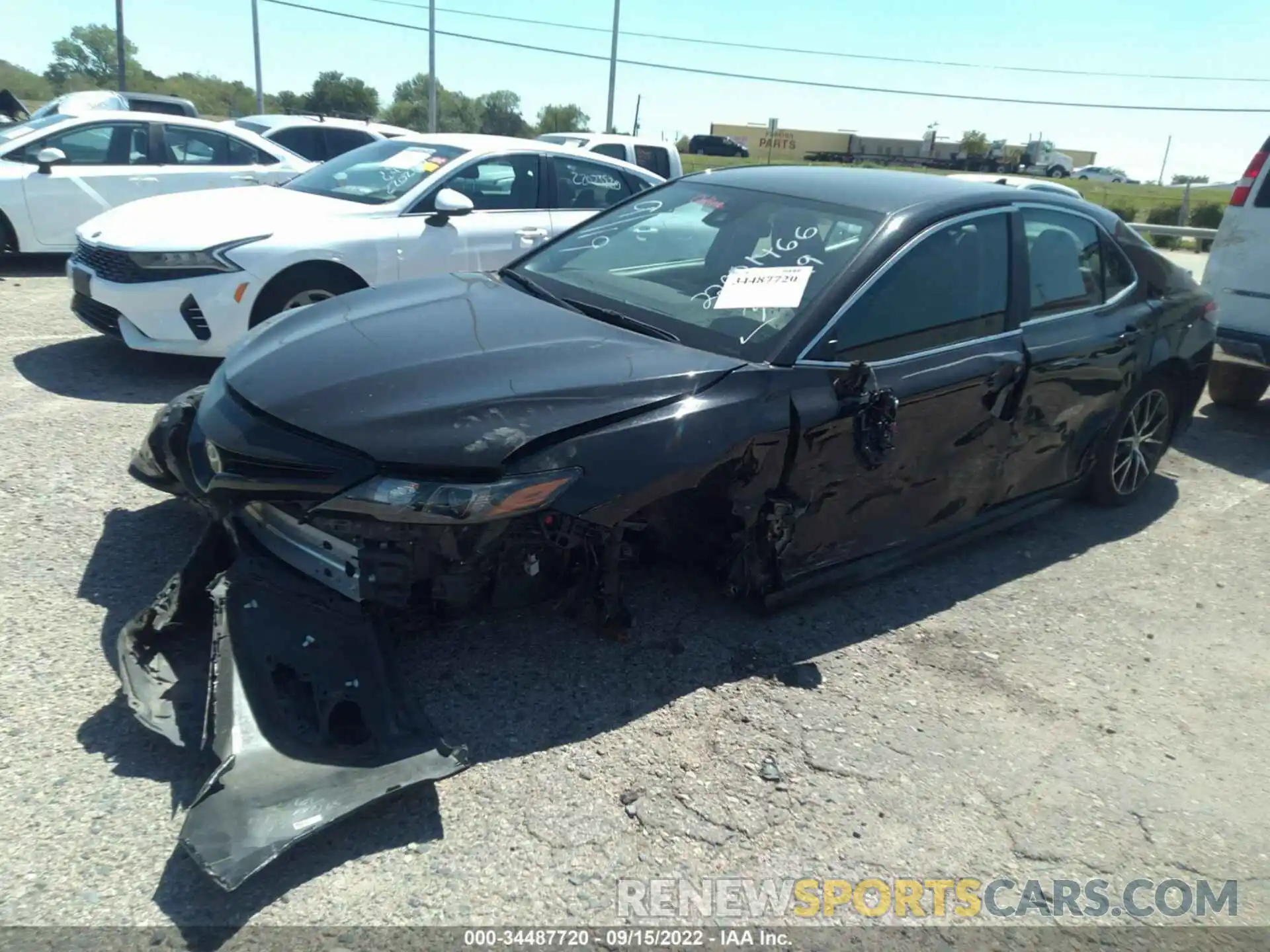 2 Photograph of a damaged car 4T1G11AK9MU552057 TOYOTA CAMRY 2021