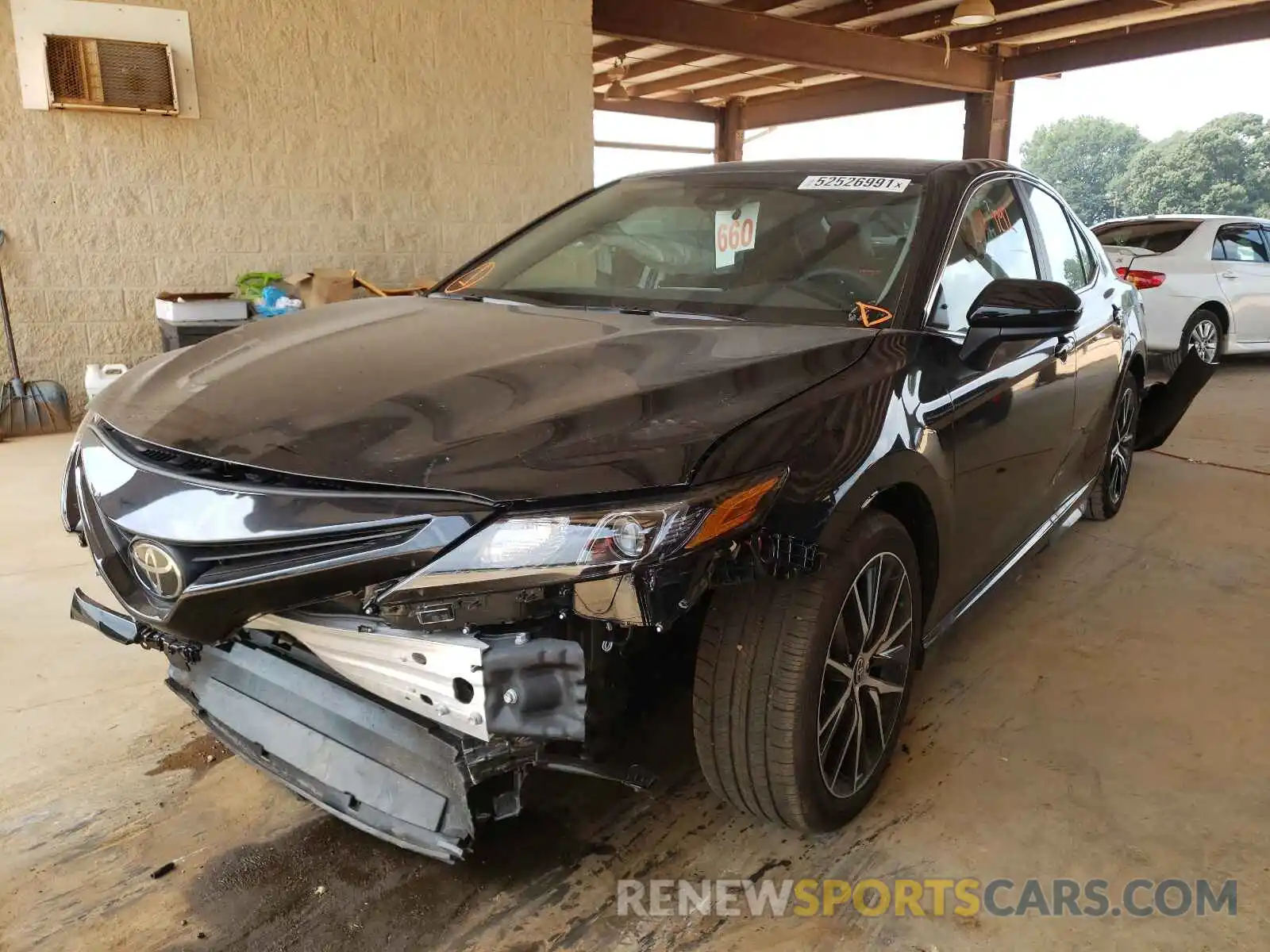 2 Photograph of a damaged car 4T1G11AK9MU579517 TOYOTA CAMRY 2021