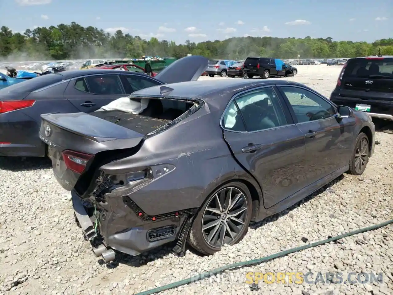 4 Photograph of a damaged car 4T1G11AK9MU592963 TOYOTA CAMRY 2021