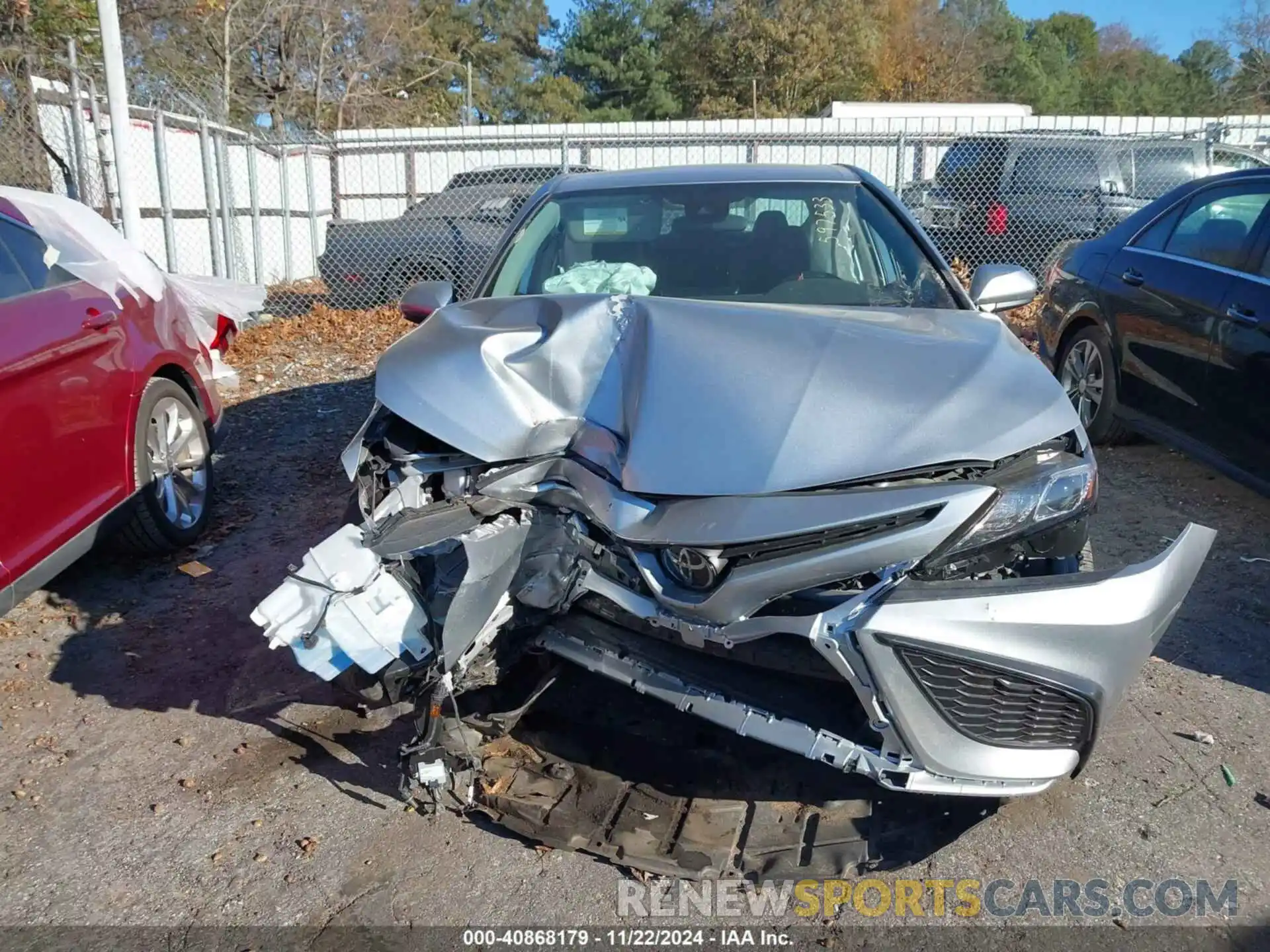 12 Photograph of a damaged car 4T1G11AK9MU597533 TOYOTA CAMRY 2021