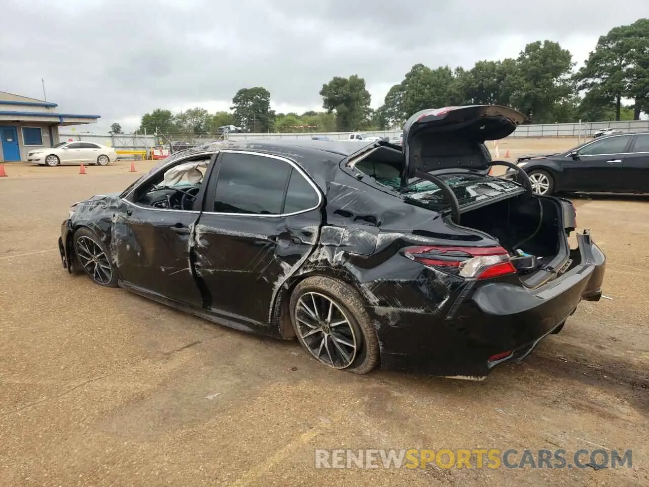 2 Photograph of a damaged car 4T1G11AK9MU603282 TOYOTA CAMRY 2021