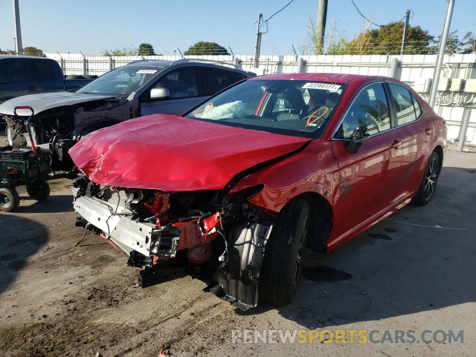 2 Photograph of a damaged car 4T1G11AKXMU410591 TOYOTA CAMRY 2021