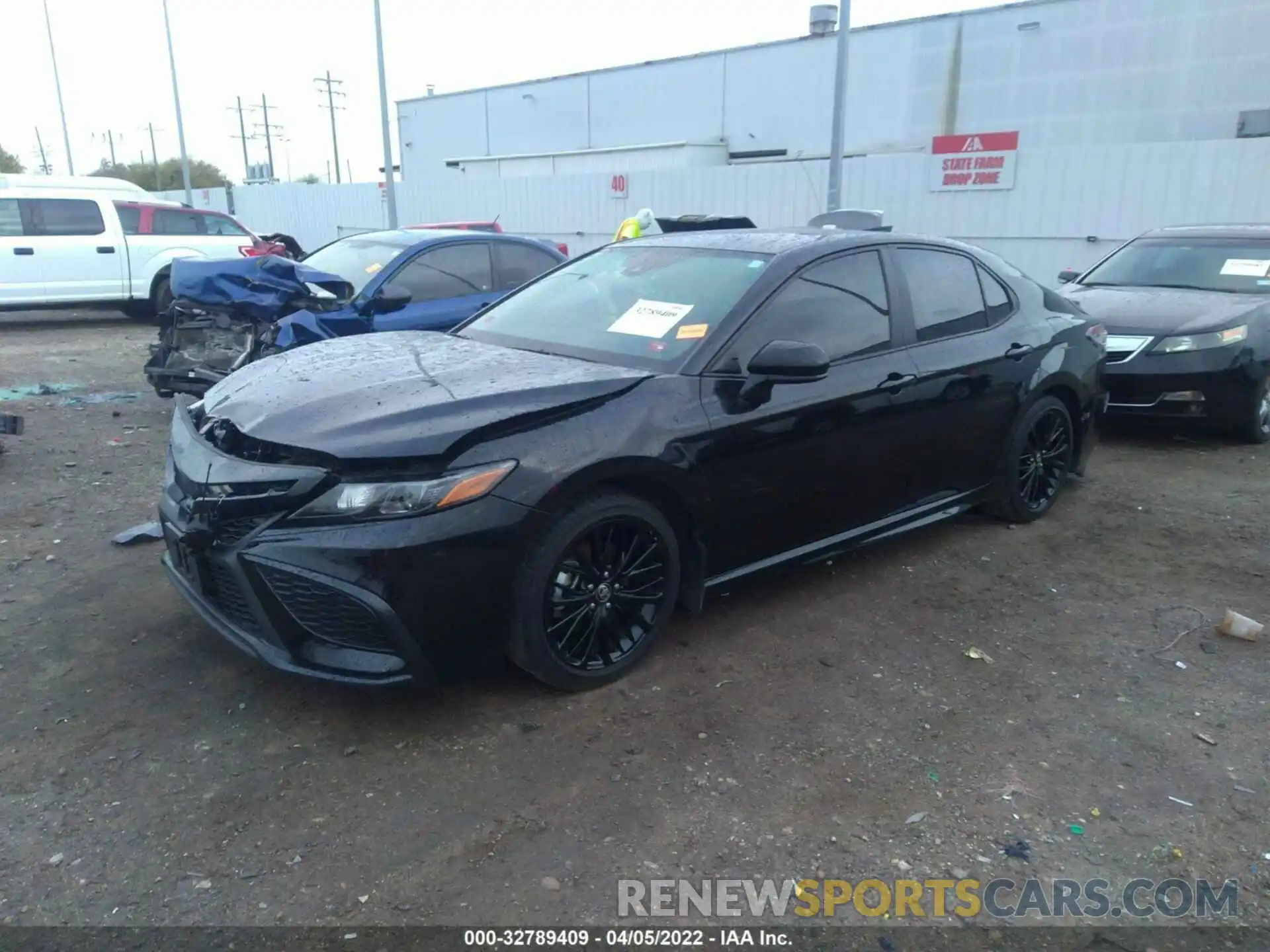 2 Photograph of a damaged car 4T1G11AKXMU452601 TOYOTA CAMRY 2021