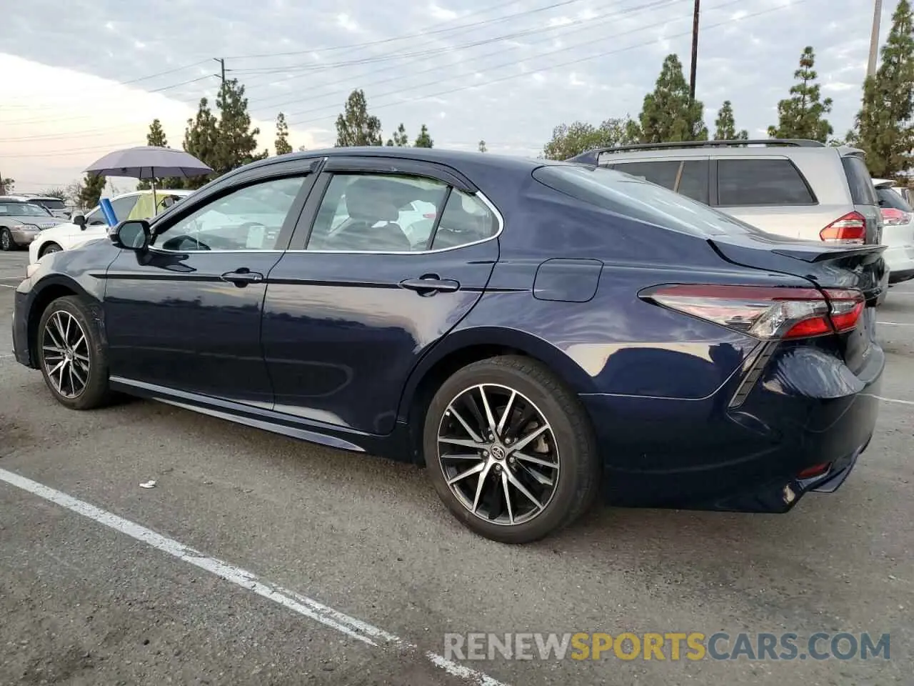 2 Photograph of a damaged car 4T1G11AKXMU453229 TOYOTA CAMRY 2021