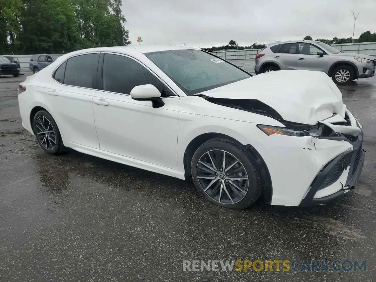 4 Photograph of a damaged car 4T1G11AKXMU470760 TOYOTA CAMRY 2021