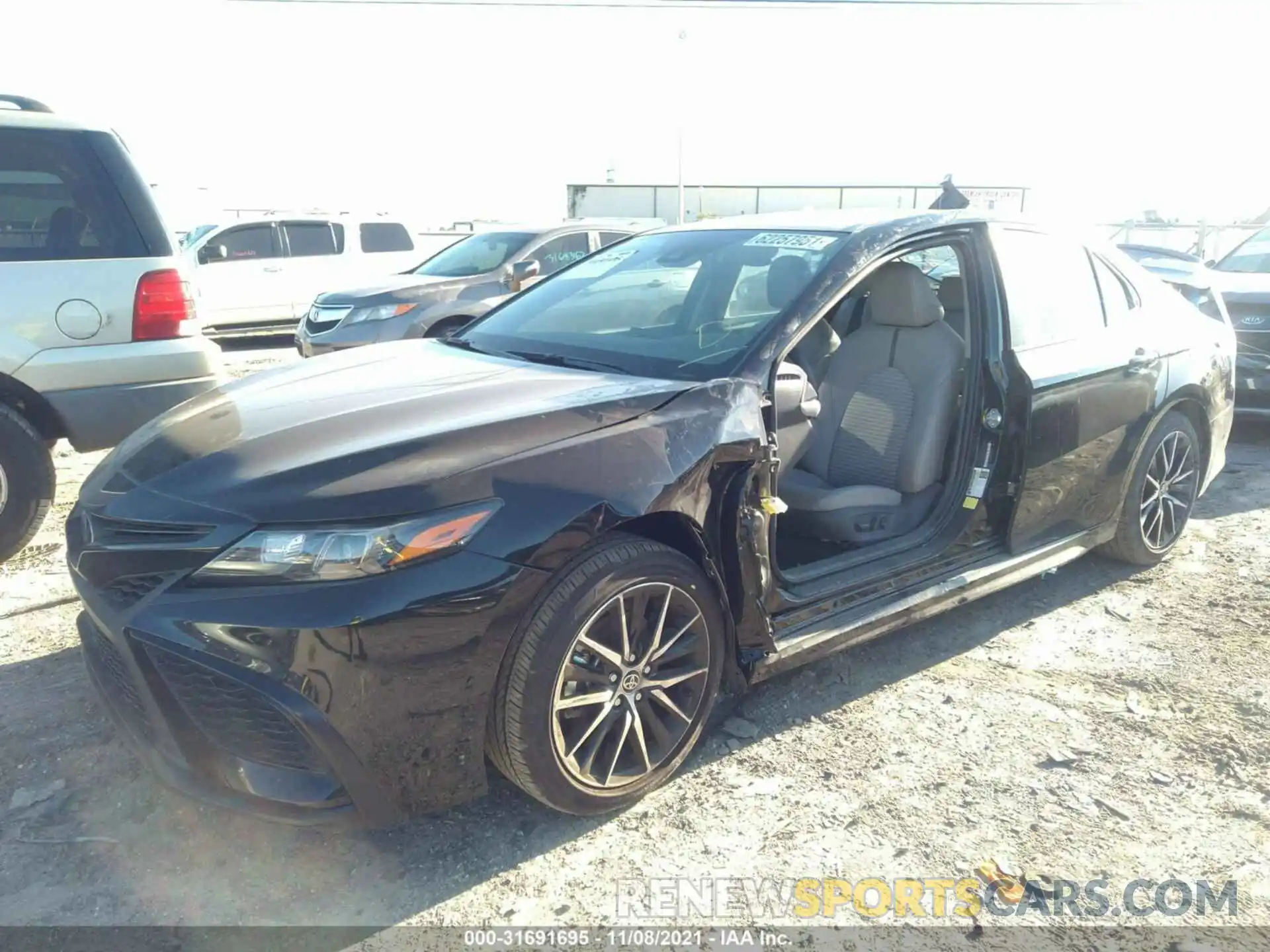 2 Photograph of a damaged car 4T1G11AKXMU491365 TOYOTA CAMRY 2021