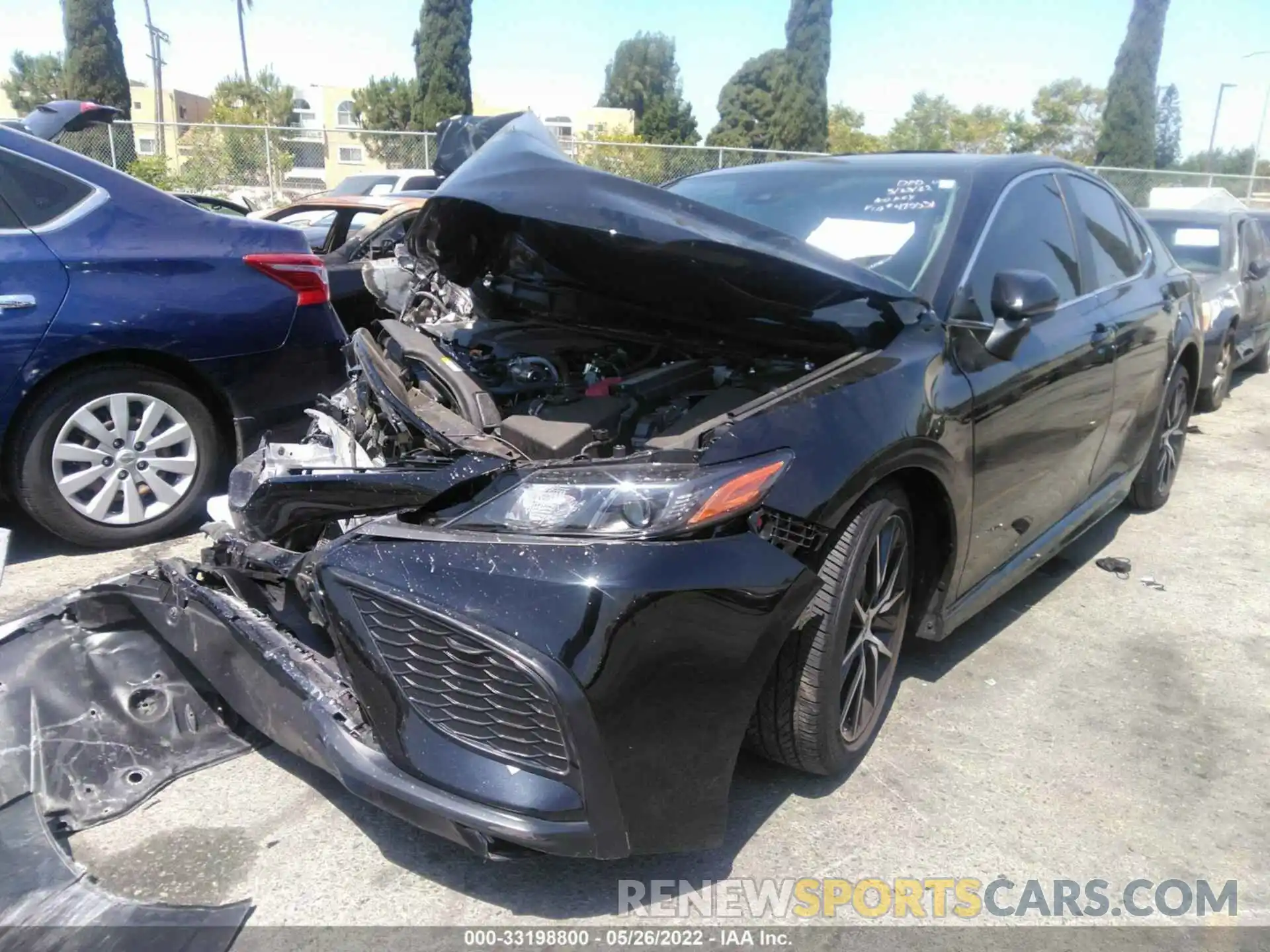 2 Photograph of a damaged car 4T1G11AKXMU495531 TOYOTA CAMRY 2021