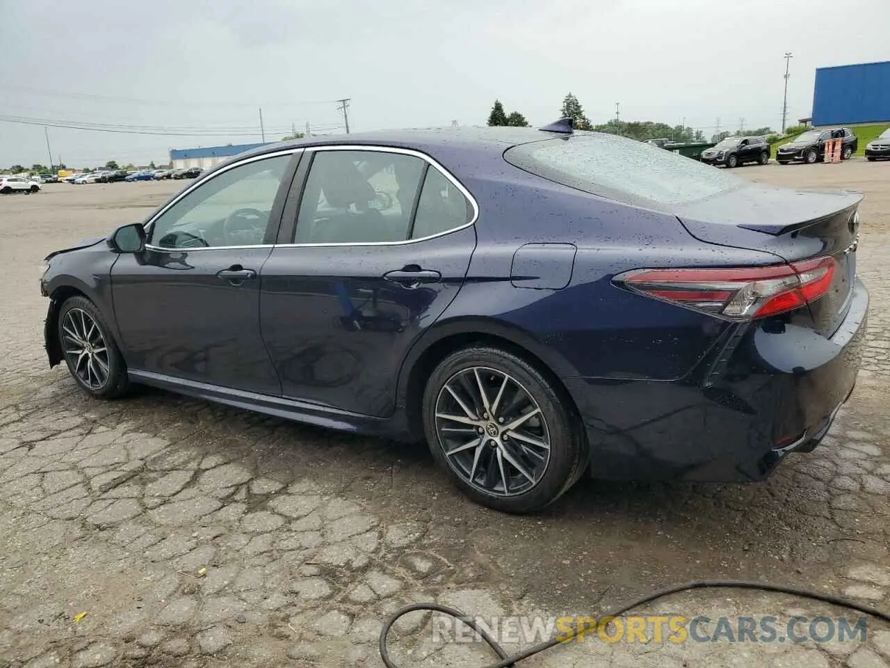 2 Photograph of a damaged car 4T1G11AKXMU559874 TOYOTA CAMRY 2021