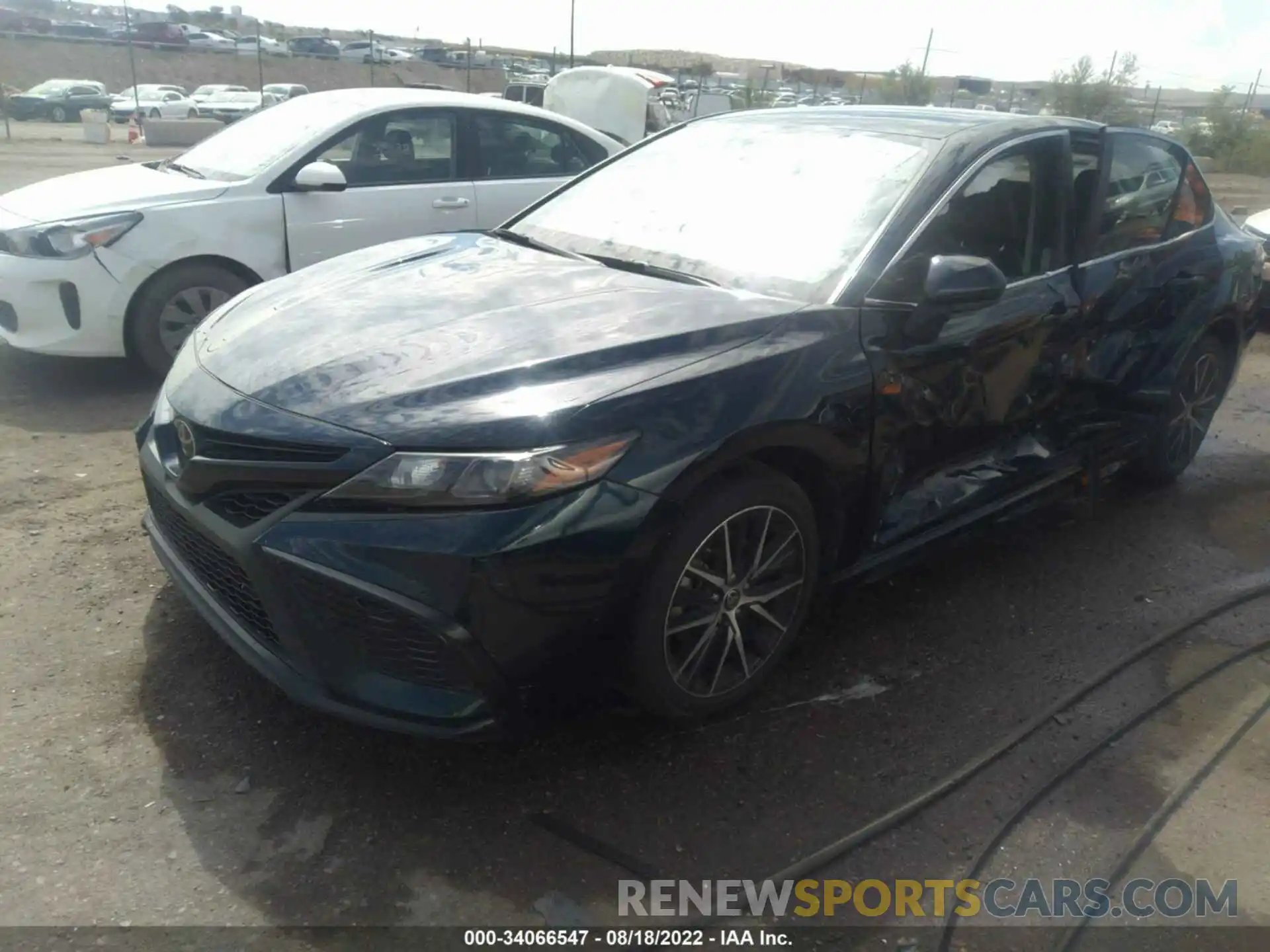 2 Photograph of a damaged car 4T1G11AKXMU563942 TOYOTA CAMRY 2021