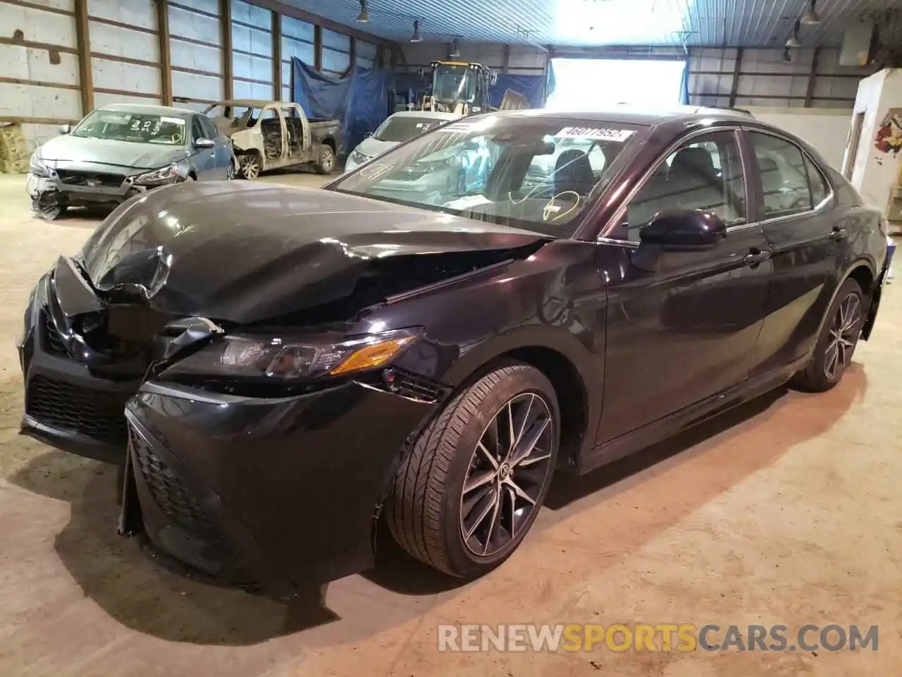 2 Photograph of a damaged car 4T1G11AKXMU569109 TOYOTA CAMRY 2021