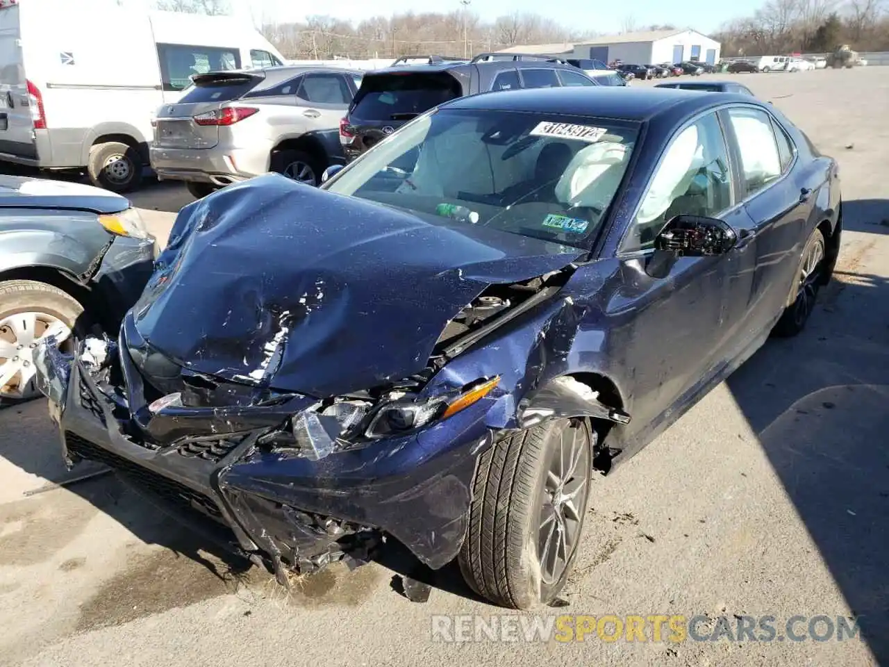 2 Photograph of a damaged car 4T1G11AKXMU573452 TOYOTA CAMRY 2021