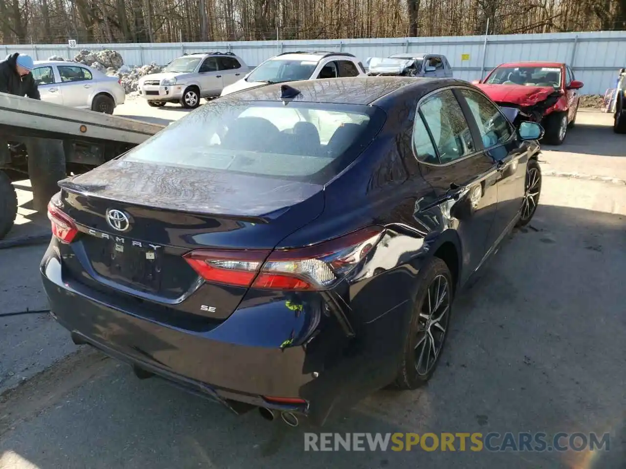 4 Photograph of a damaged car 4T1G11AKXMU573452 TOYOTA CAMRY 2021