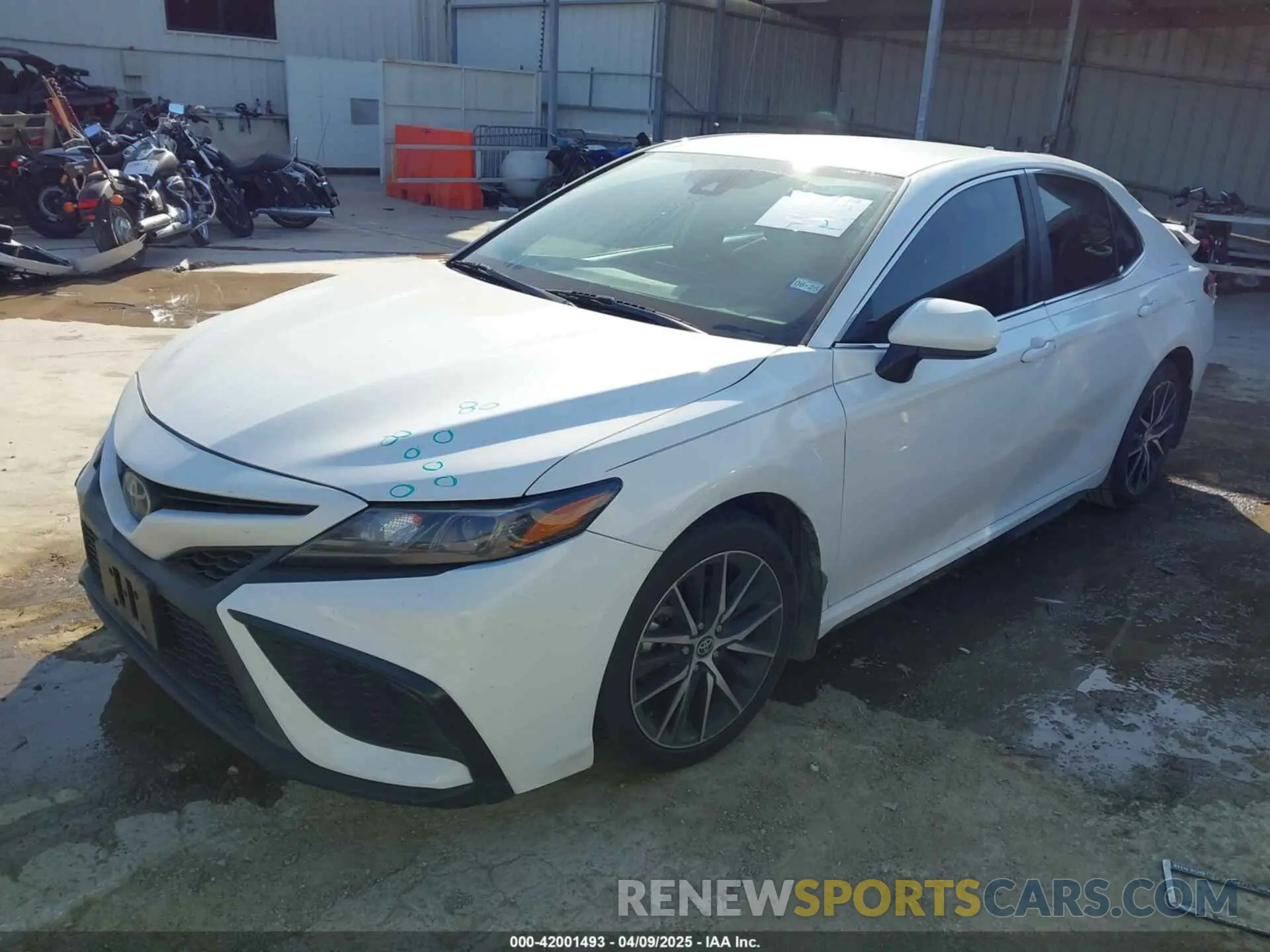 2 Photograph of a damaged car 4T1G11AKXMU574892 TOYOTA CAMRY 2021
