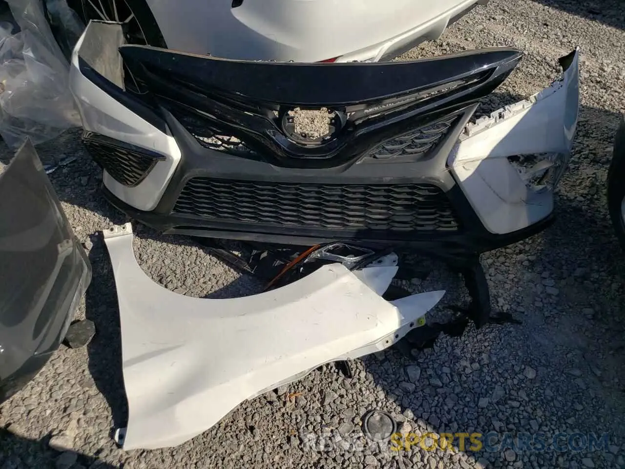 12 Photograph of a damaged car 4T1G11AKXMU585956 TOYOTA CAMRY 2021