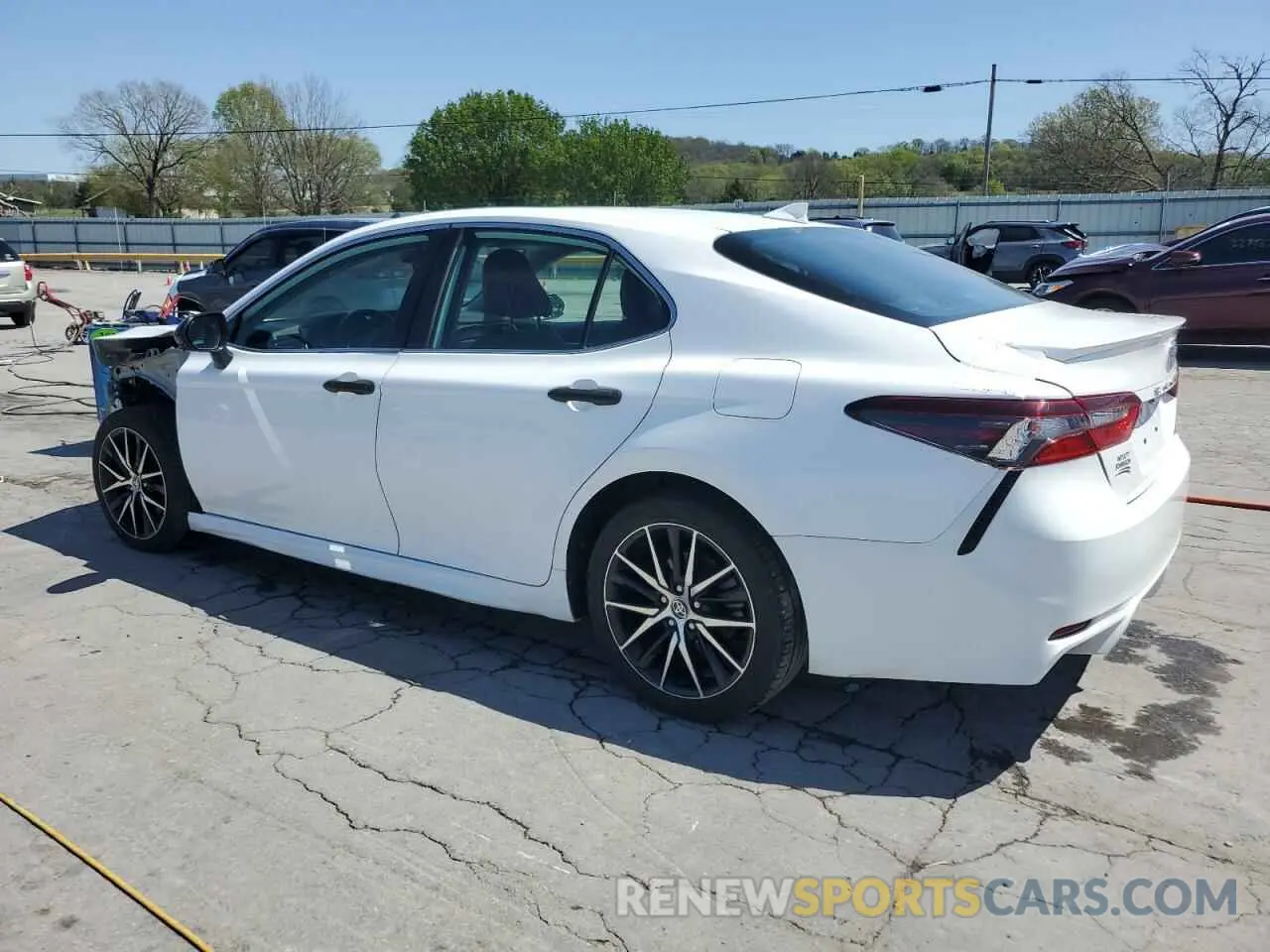 2 Photograph of a damaged car 4T1G11AKXMU585956 TOYOTA CAMRY 2021