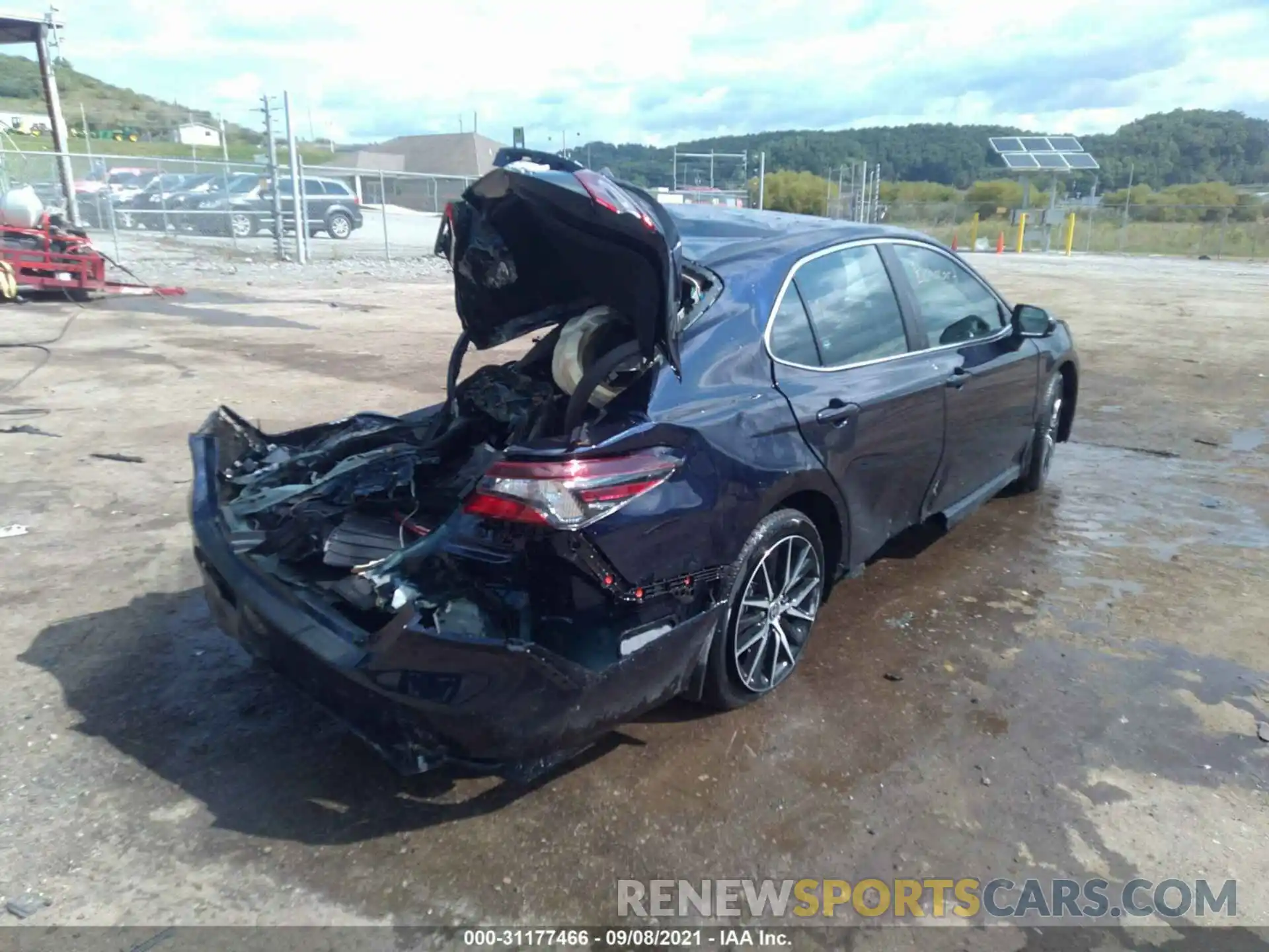 4 Photograph of a damaged car 4T1G11BK2MU045581 TOYOTA CAMRY 2021