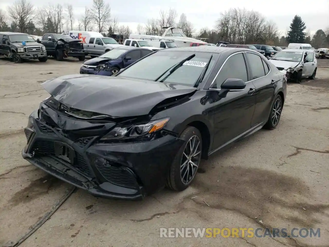 2 Photograph of a damaged car 4T1G11BK3MU024769 TOYOTA CAMRY 2021