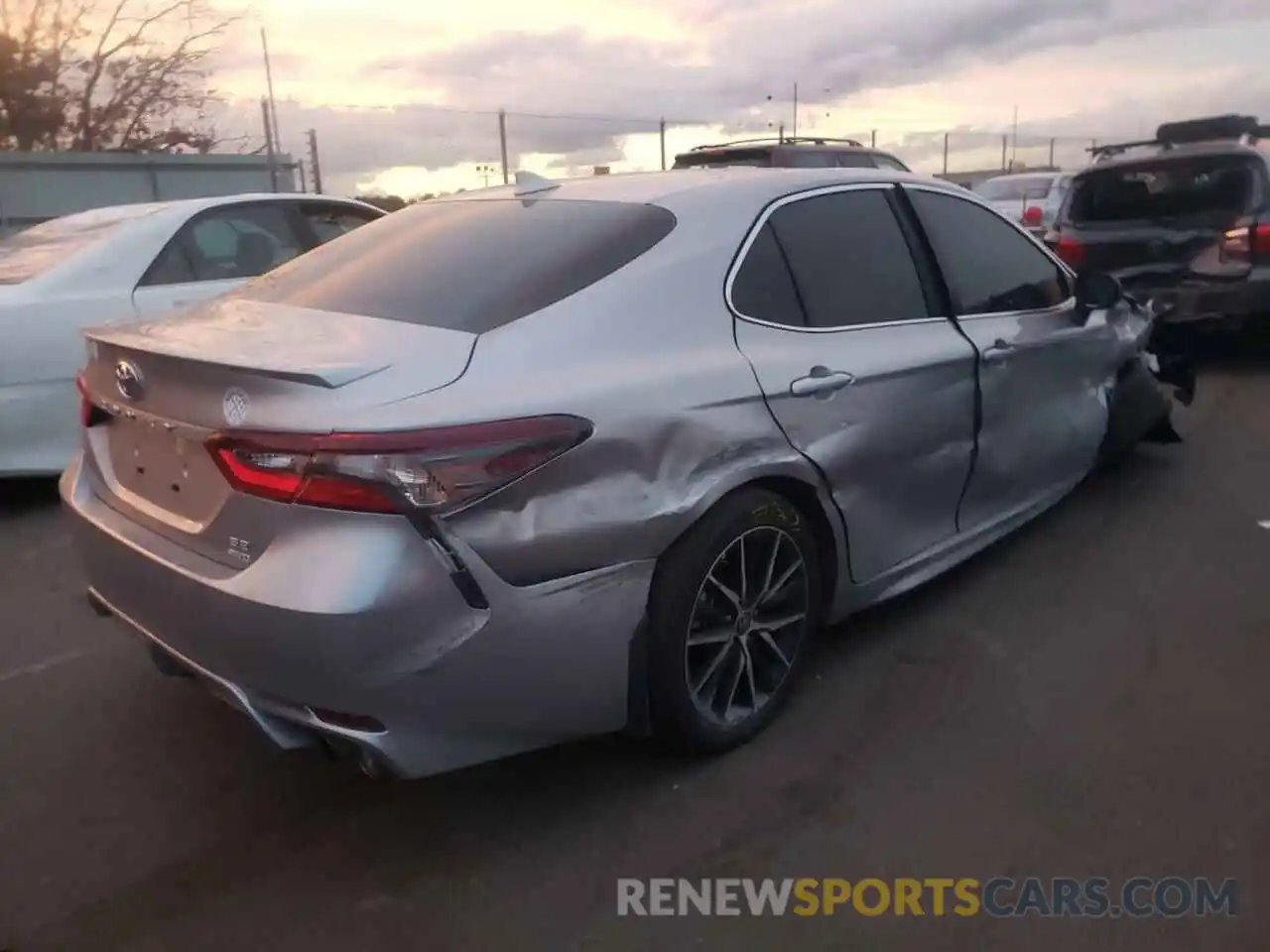 4 Photograph of a damaged car 4T1G11BK3MU029177 TOYOTA CAMRY 2021