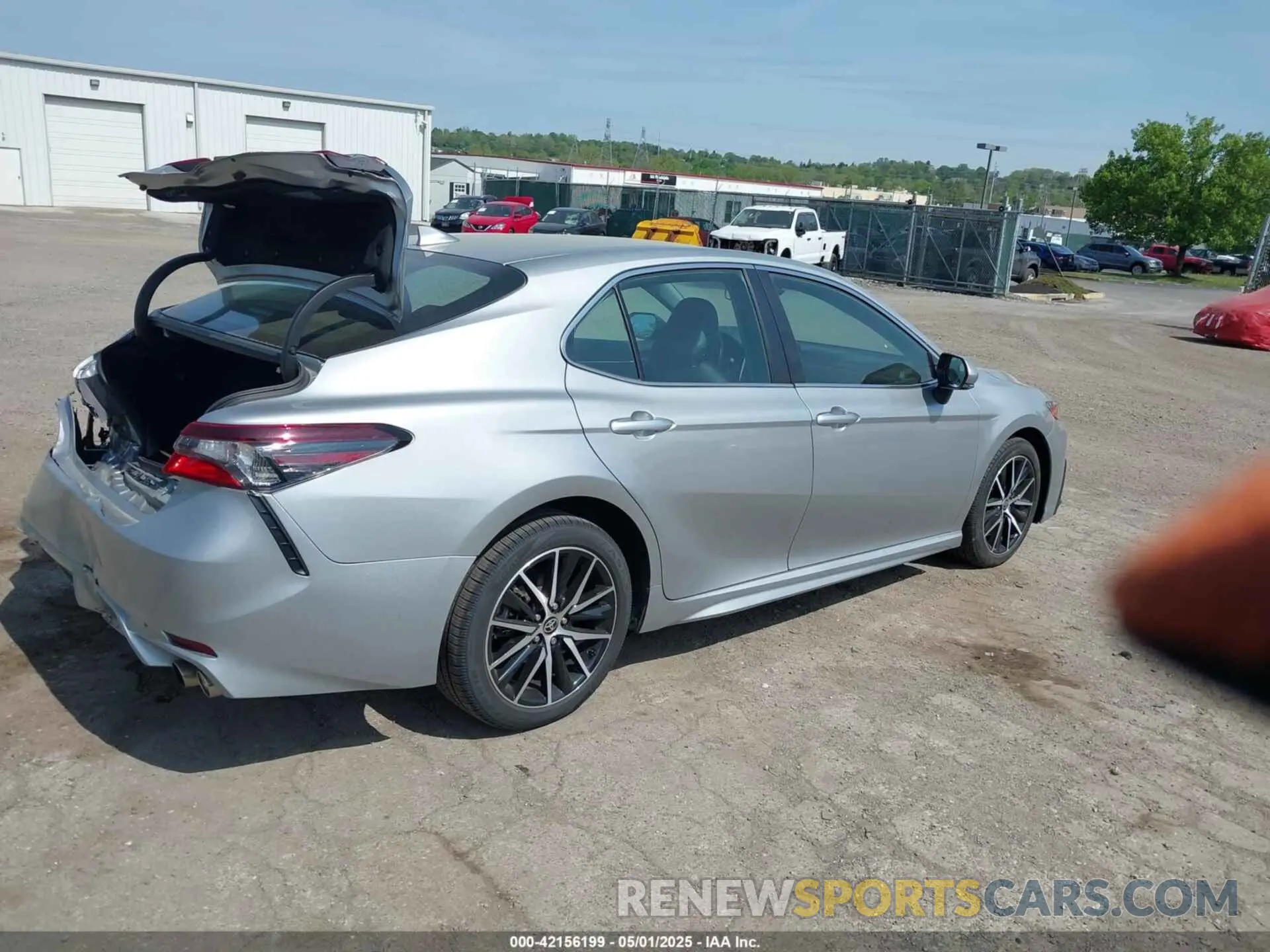 4 Photograph of a damaged car 4T1G11BK4MU033349 TOYOTA CAMRY 2021