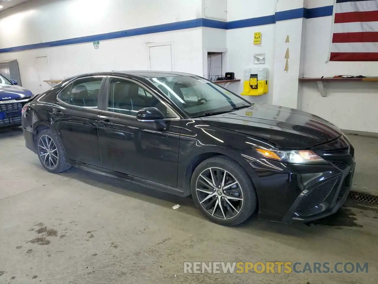 4 Photograph of a damaged car 4T1G11BK5MU029651 TOYOTA CAMRY 2021