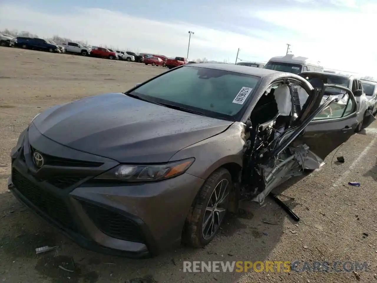 2 Photograph of a damaged car 4T1G11BK5MU035109 TOYOTA CAMRY 2021