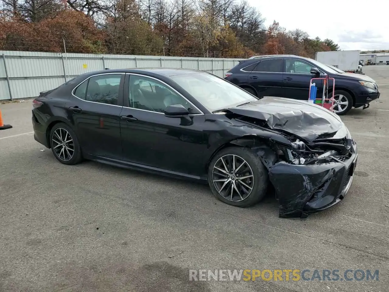4 Photograph of a damaged car 4T1G11BK7MU029716 TOYOTA CAMRY 2021