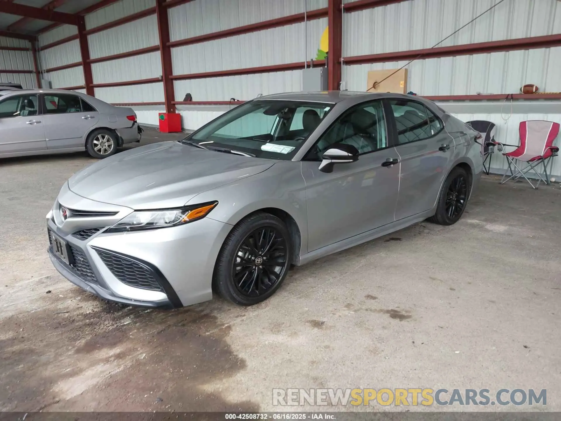 2 Photograph of a damaged car 4T1G11BKXMU023067 TOYOTA CAMRY 2021