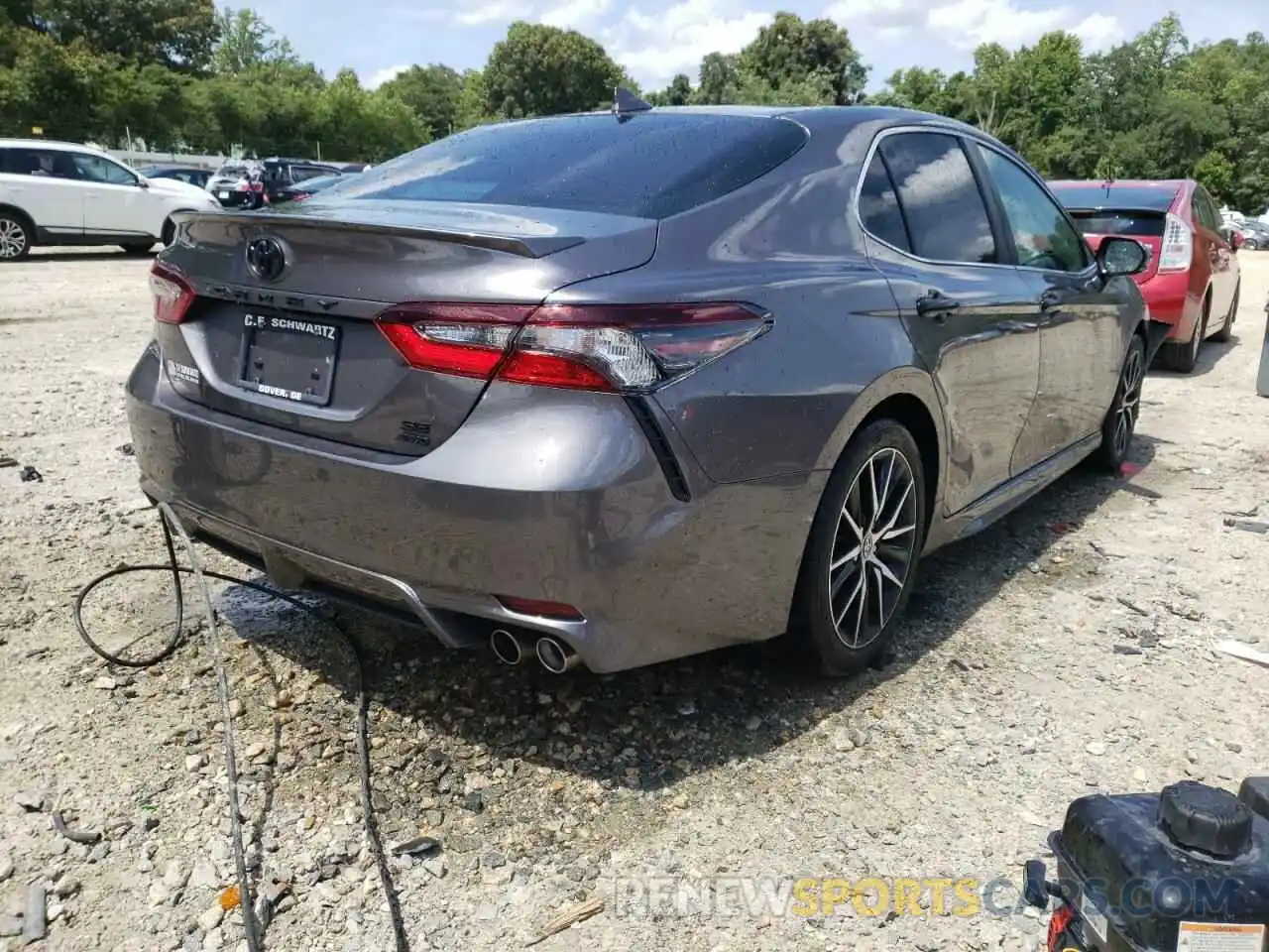 4 Photograph of a damaged car 4T1G11BKXMU027569 TOYOTA CAMRY 2021