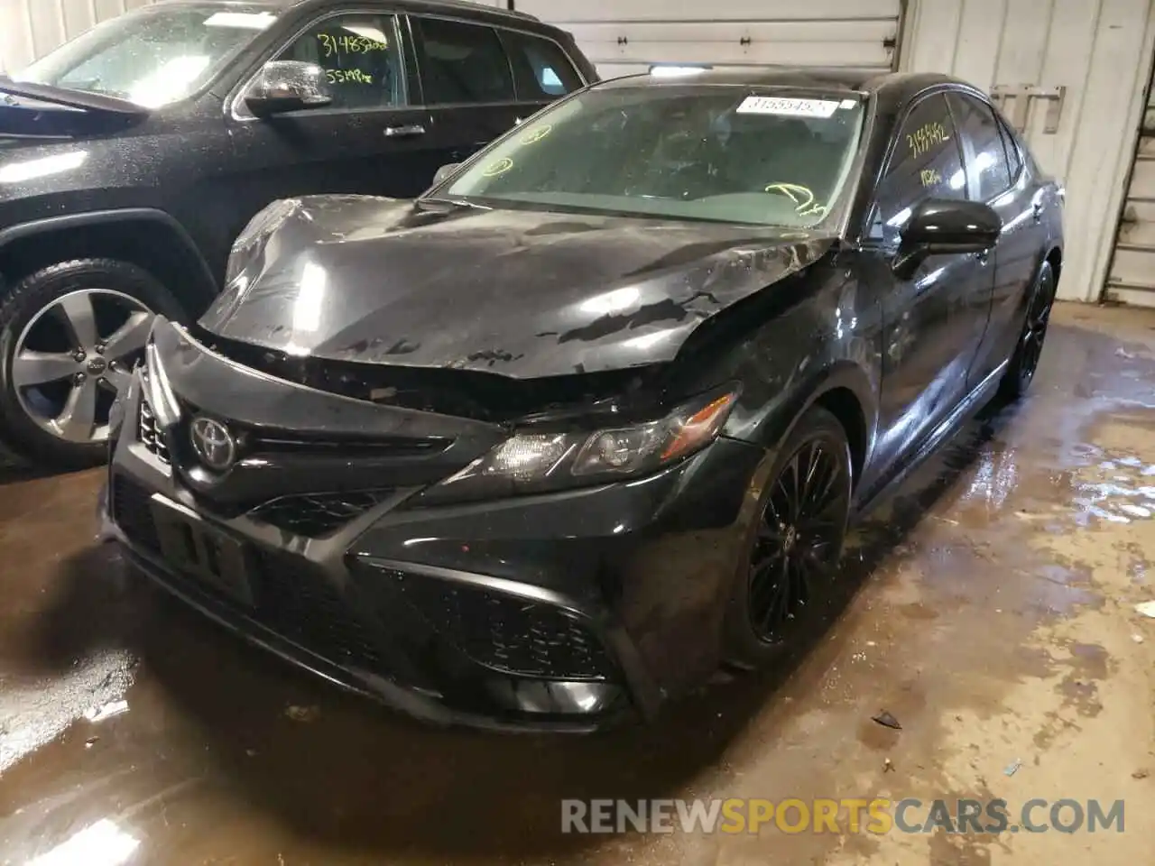 2 Photograph of a damaged car 4T1G11BKXMU028219 TOYOTA CAMRY 2021