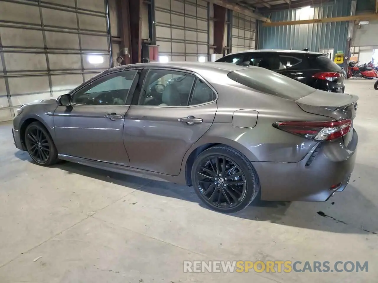 2 Photograph of a damaged car 4T1K31AK2MU029807 TOYOTA CAMRY 2021