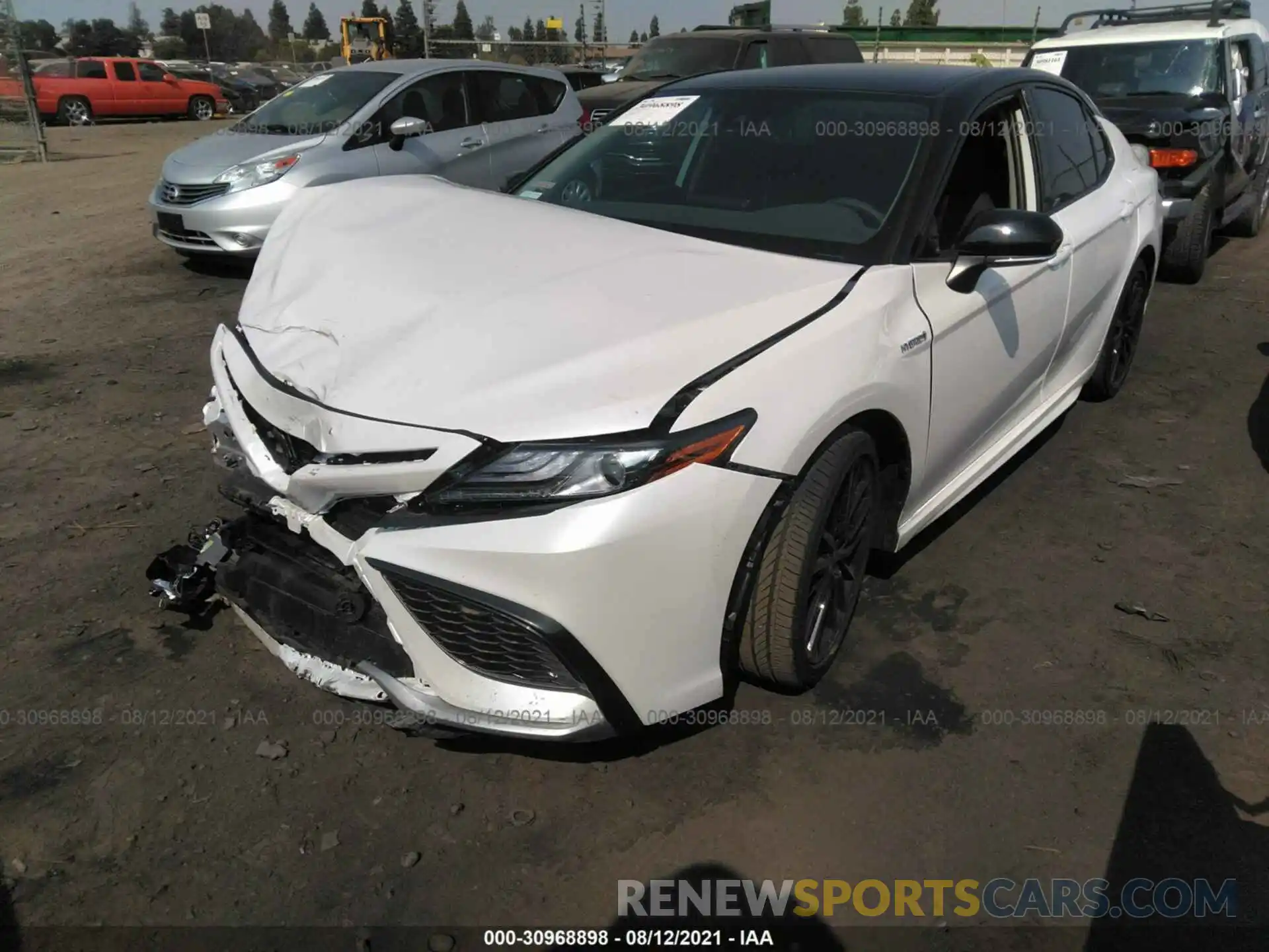 2 Photograph of a damaged car 4T1K31AK4MU028836 TOYOTA CAMRY 2021