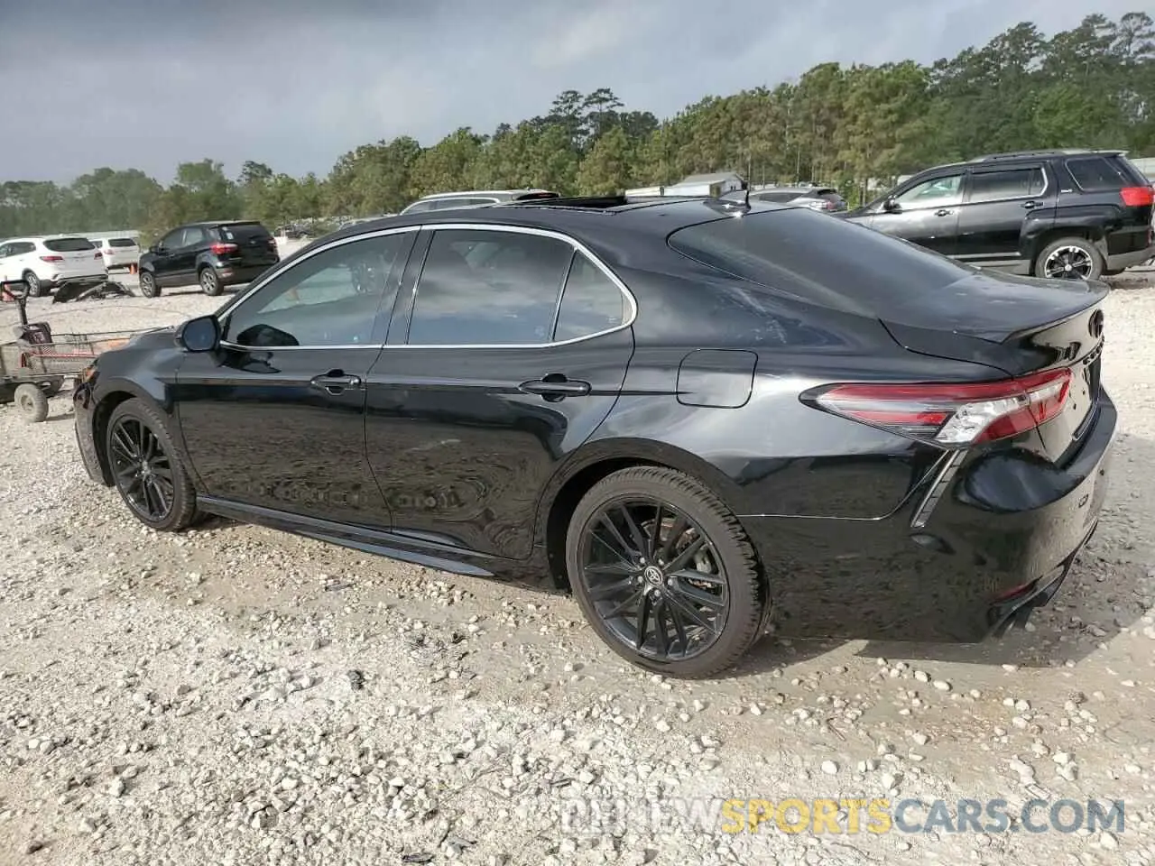 2 Photograph of a damaged car 4T1K61AK0MU586593 TOYOTA CAMRY 2021