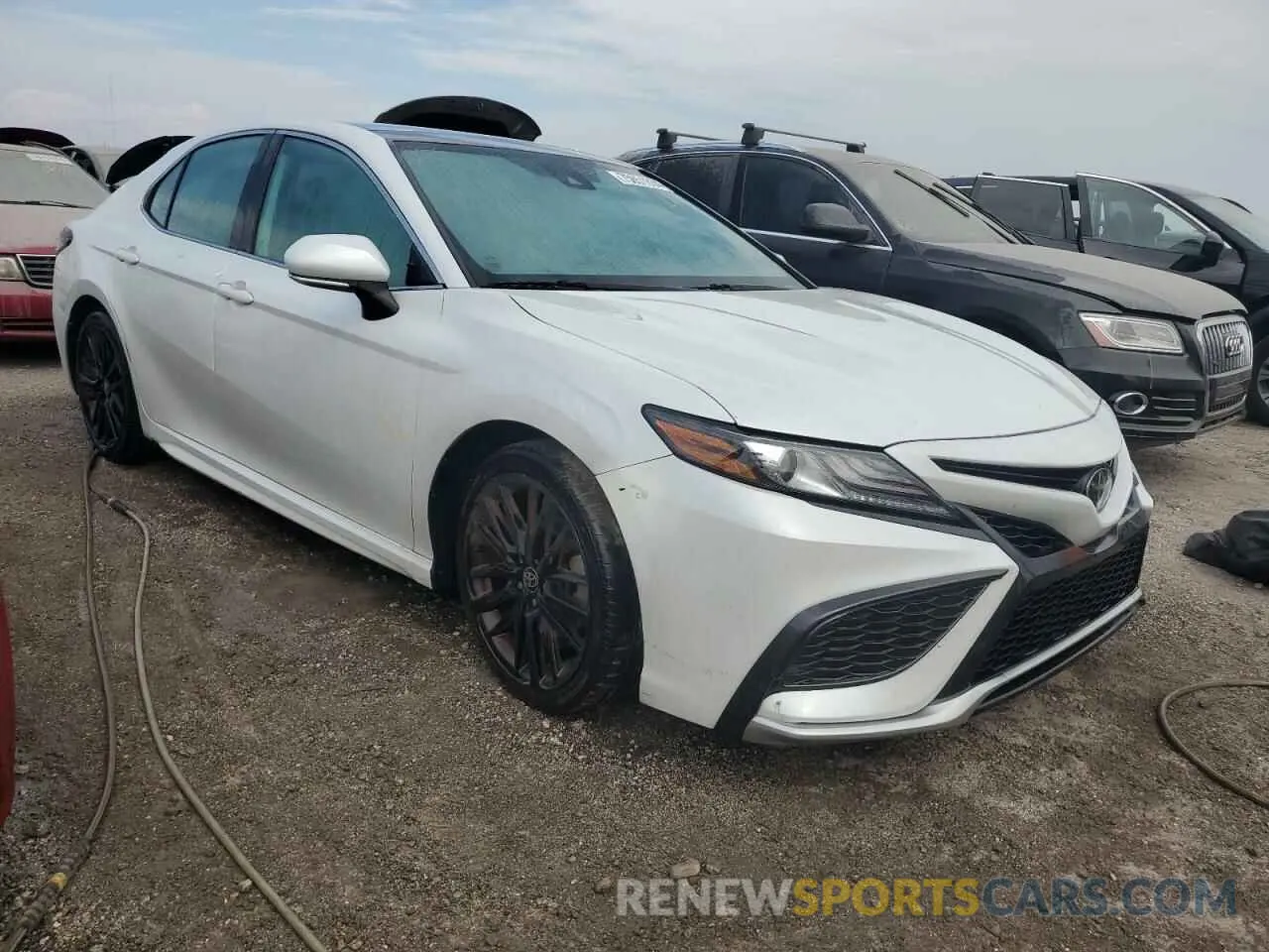 4 Photograph of a damaged car 4T1K61AK3MU410850 TOYOTA CAMRY 2021