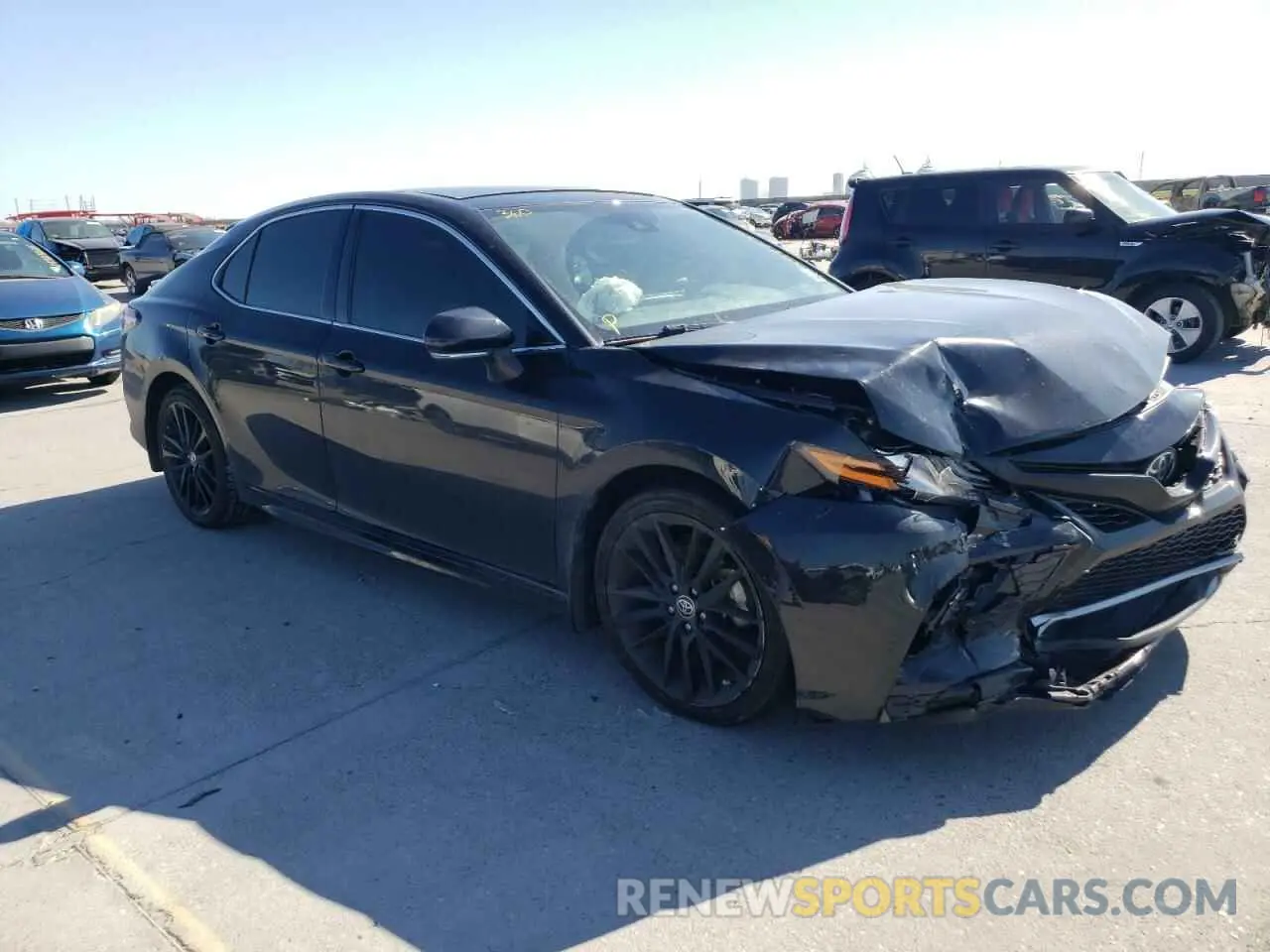 4 Photograph of a damaged car 4T1K61AK7MU603924 TOYOTA CAMRY 2021