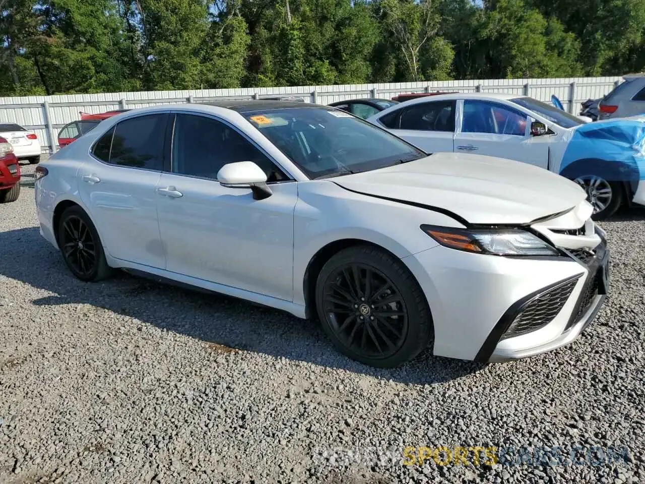 4 Photograph of a damaged car 4T1K61AK9MU599892 TOYOTA CAMRY 2021