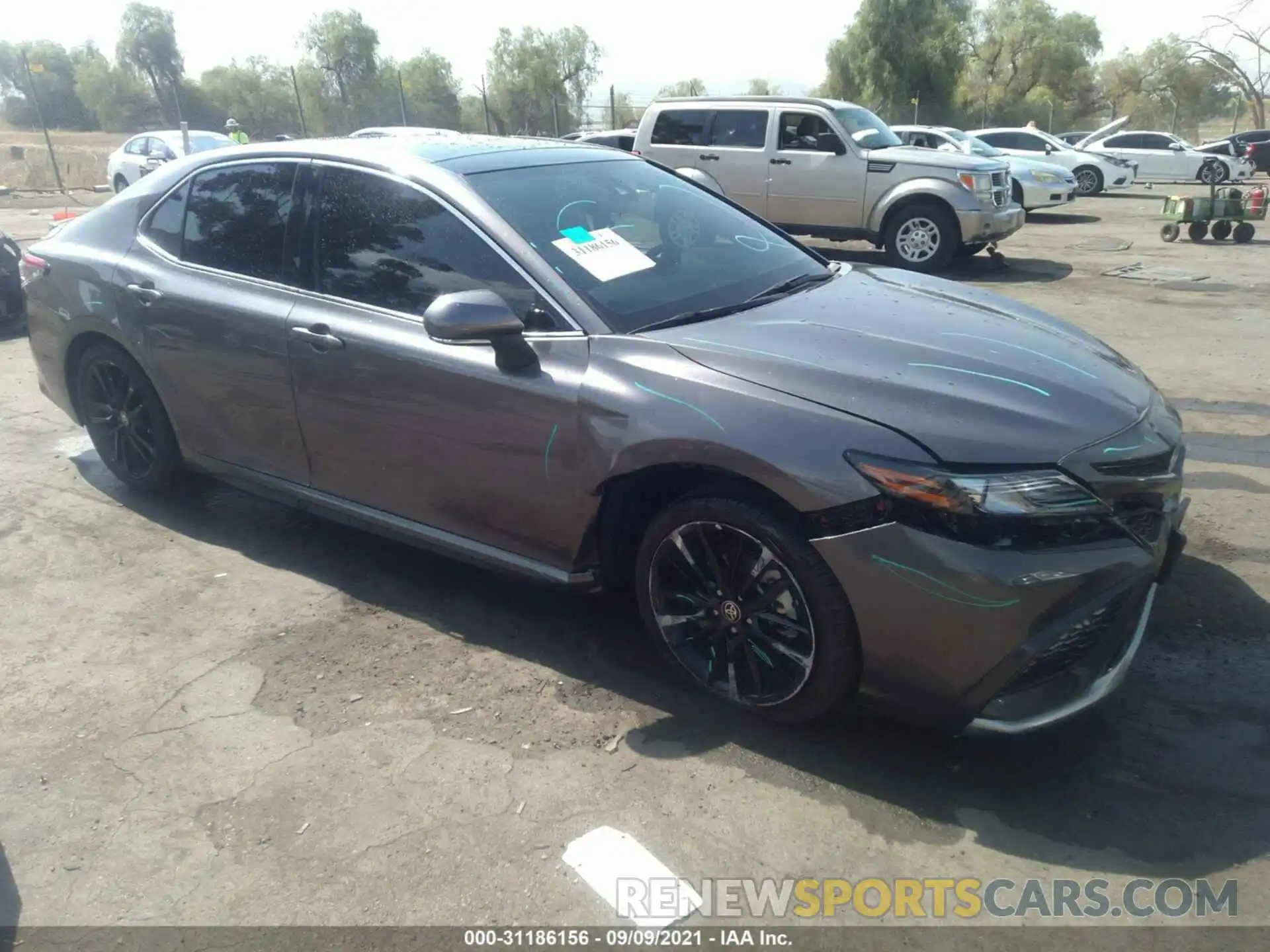 1 Photograph of a damaged car 4T1K61AKXMU454022 TOYOTA CAMRY 2021