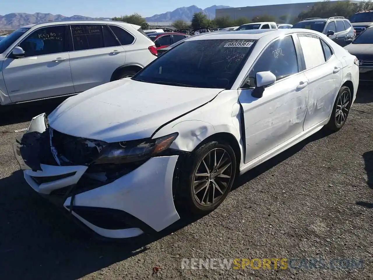 2 Photograph of a damaged car 4T1S11AK6MU603945 TOYOTA CAMRY 2021