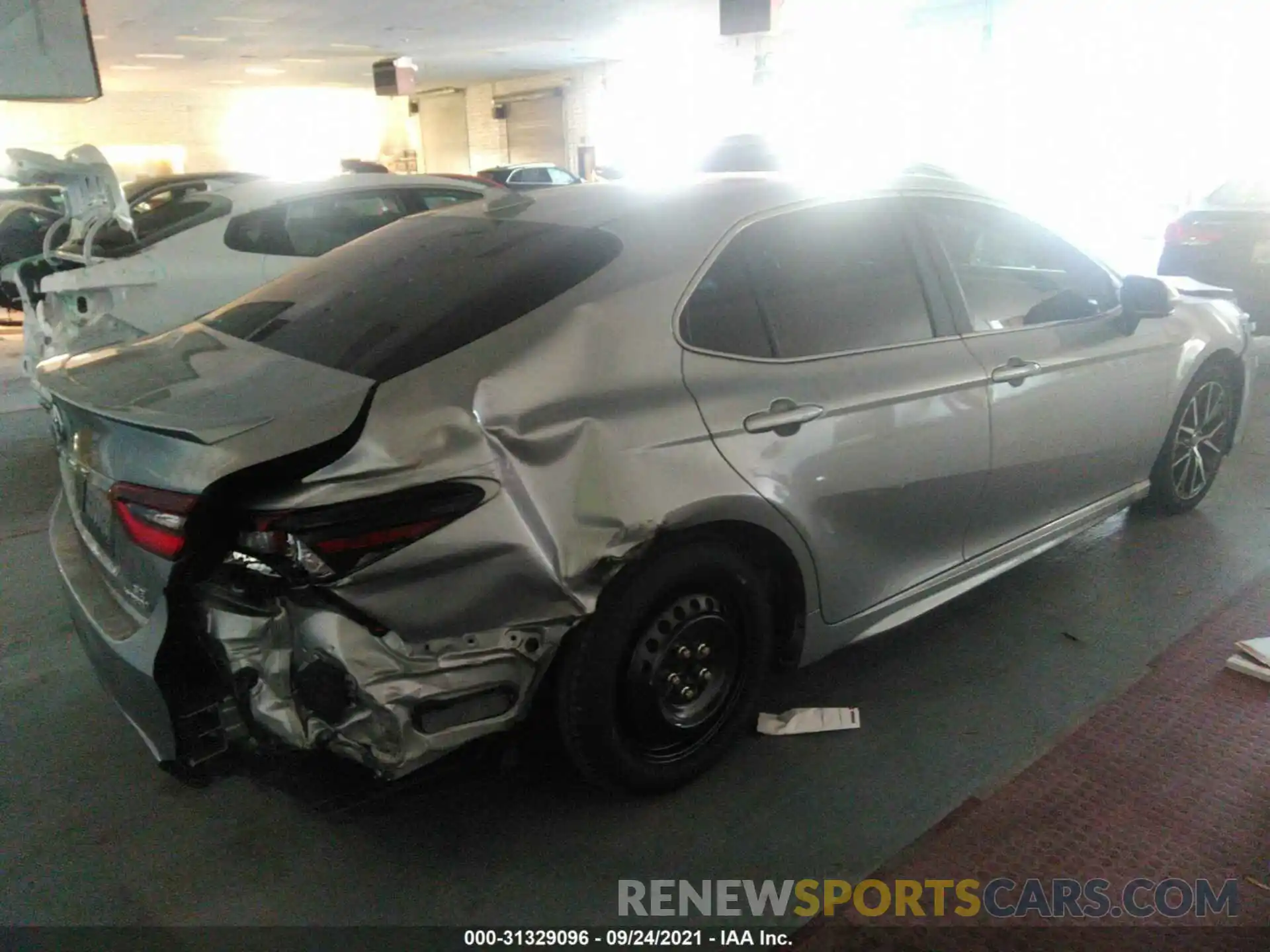 4 Photograph of a damaged car 4T1S31AK6MU024285 TOYOTA CAMRY 2021