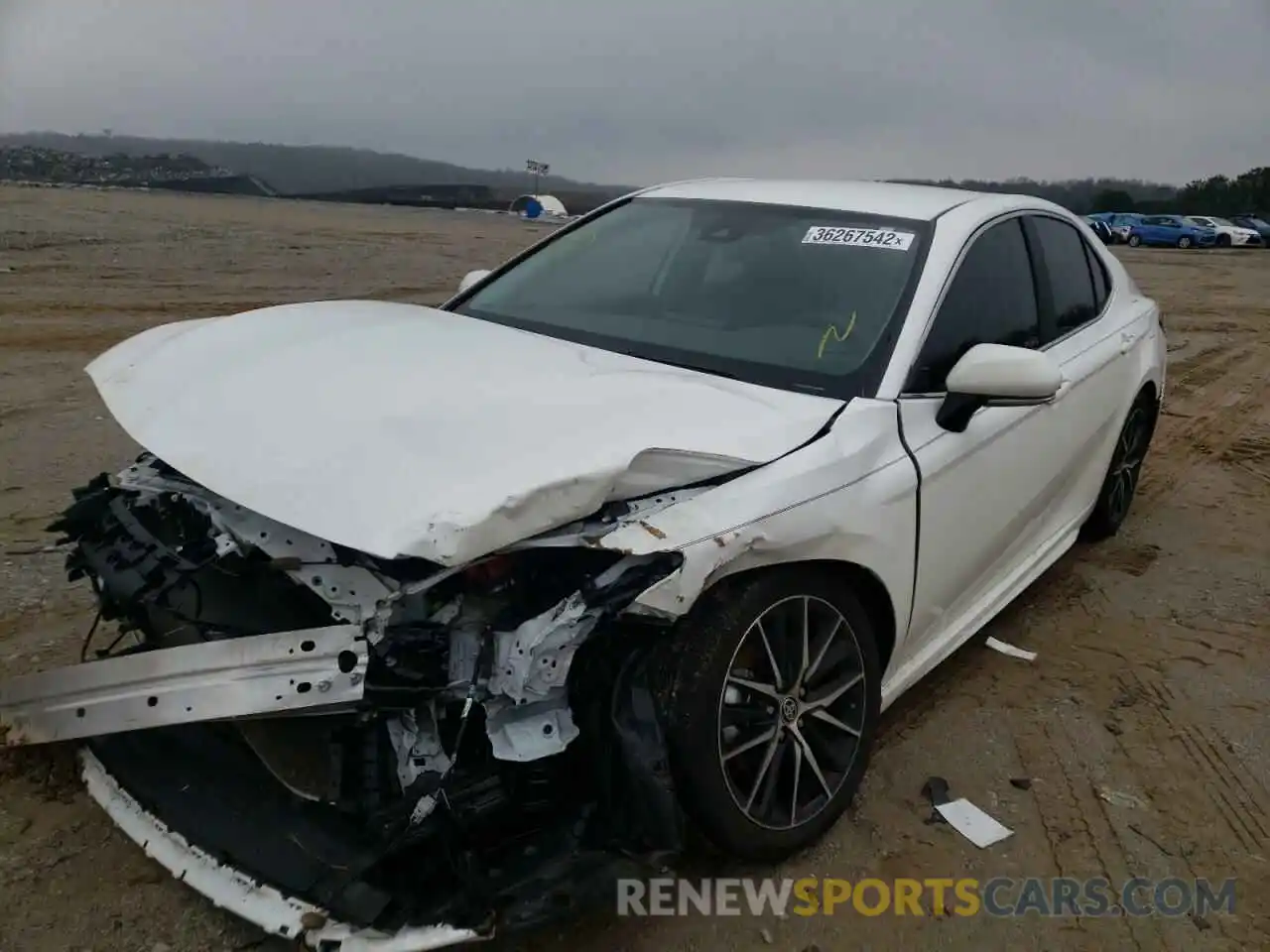 2 Photograph of a damaged car 4T1T11AK0MU560949 TOYOTA CAMRY 2021