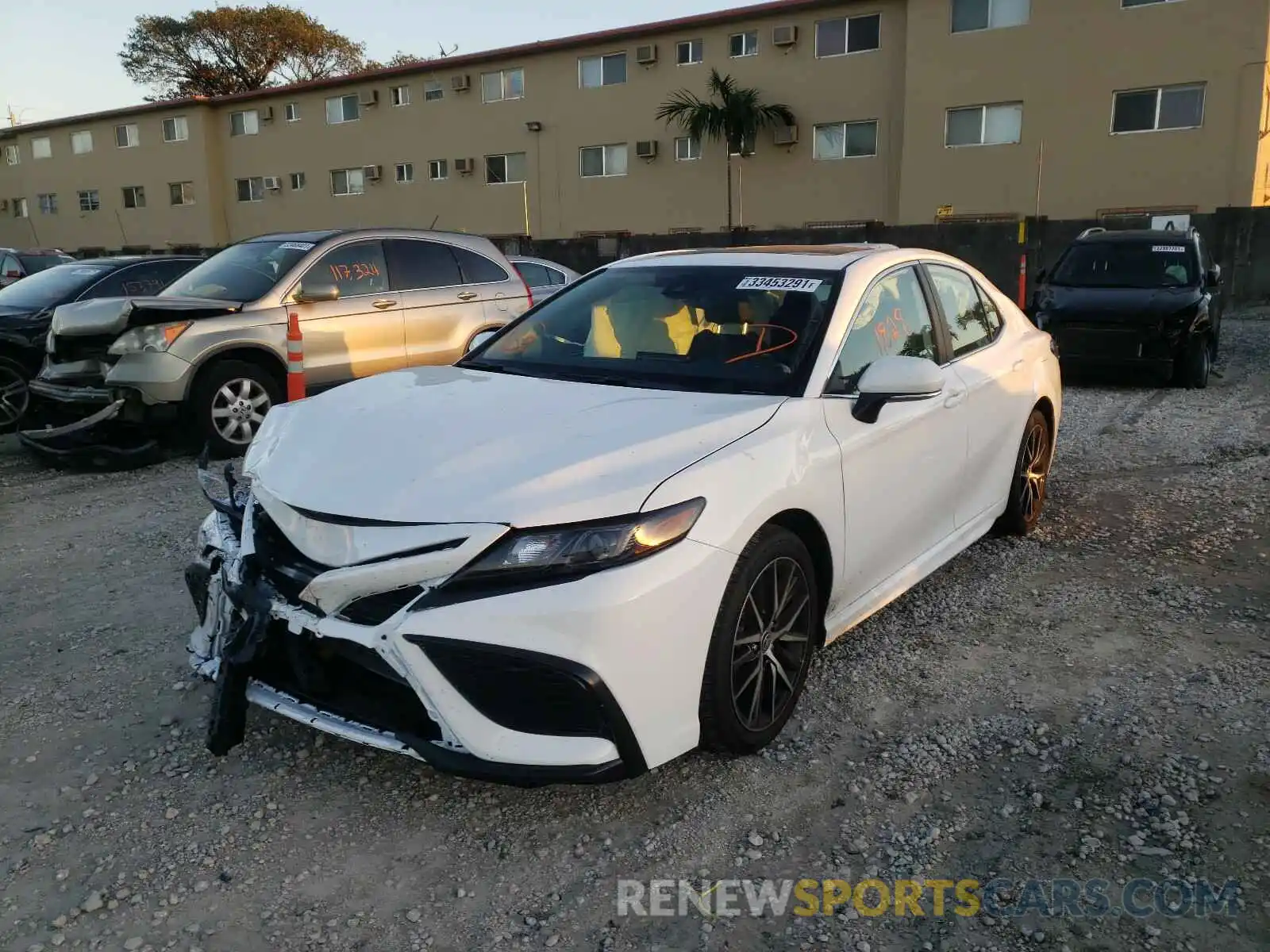 2 Photograph of a damaged car 4T1T11BK4MU023743 TOYOTA CAMRY 2021