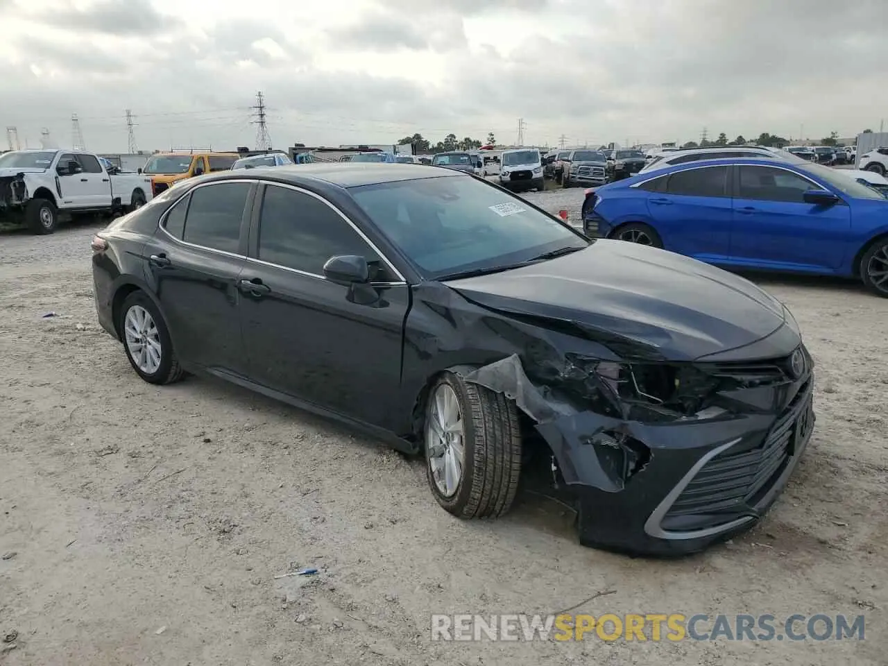 4 Photograph of a damaged car 4T1C11AK2NU693410 TOYOTA CAMRY 2022